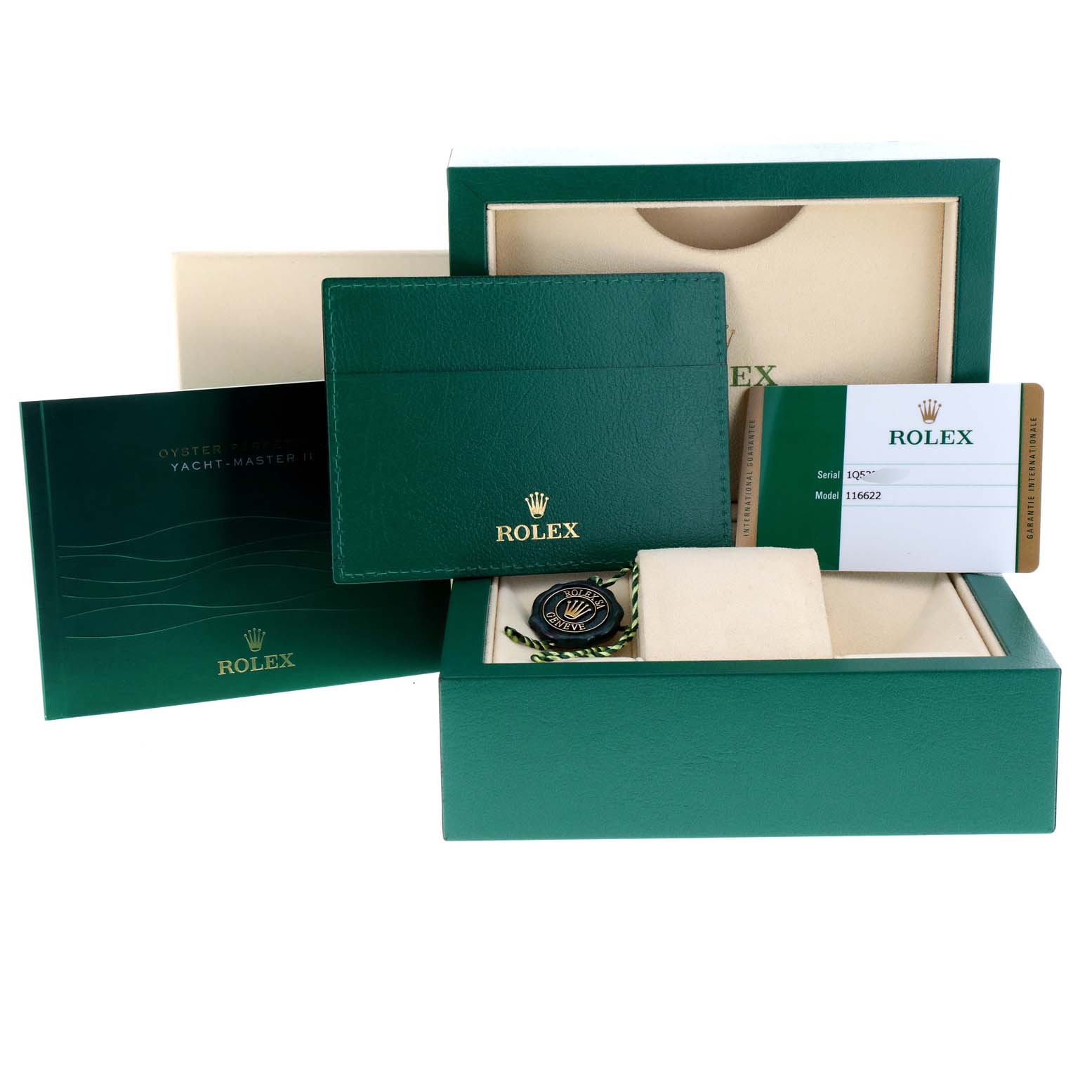 The image shows the packaging and accessories for a Rolex Yacht-Master 116622 Men
s Stainless Steel Grey Dial 116622 Men
s Stainless Steel Grey Dial watch, including a box, booklet, warranty card, and tag.