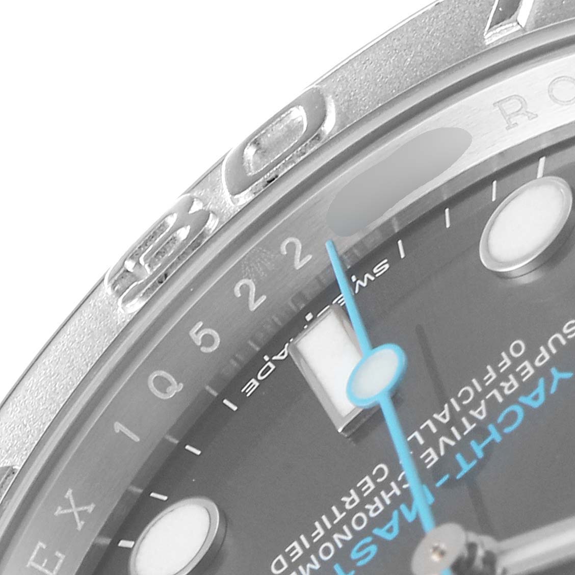 This image shows a close-up of the bezel, dial, and part of the hour hand of a Rolex Yacht-Master 116622 Men
s Stainless Steel Grey Dial 116622 Men
s Stainless Steel Grey Dial watch.