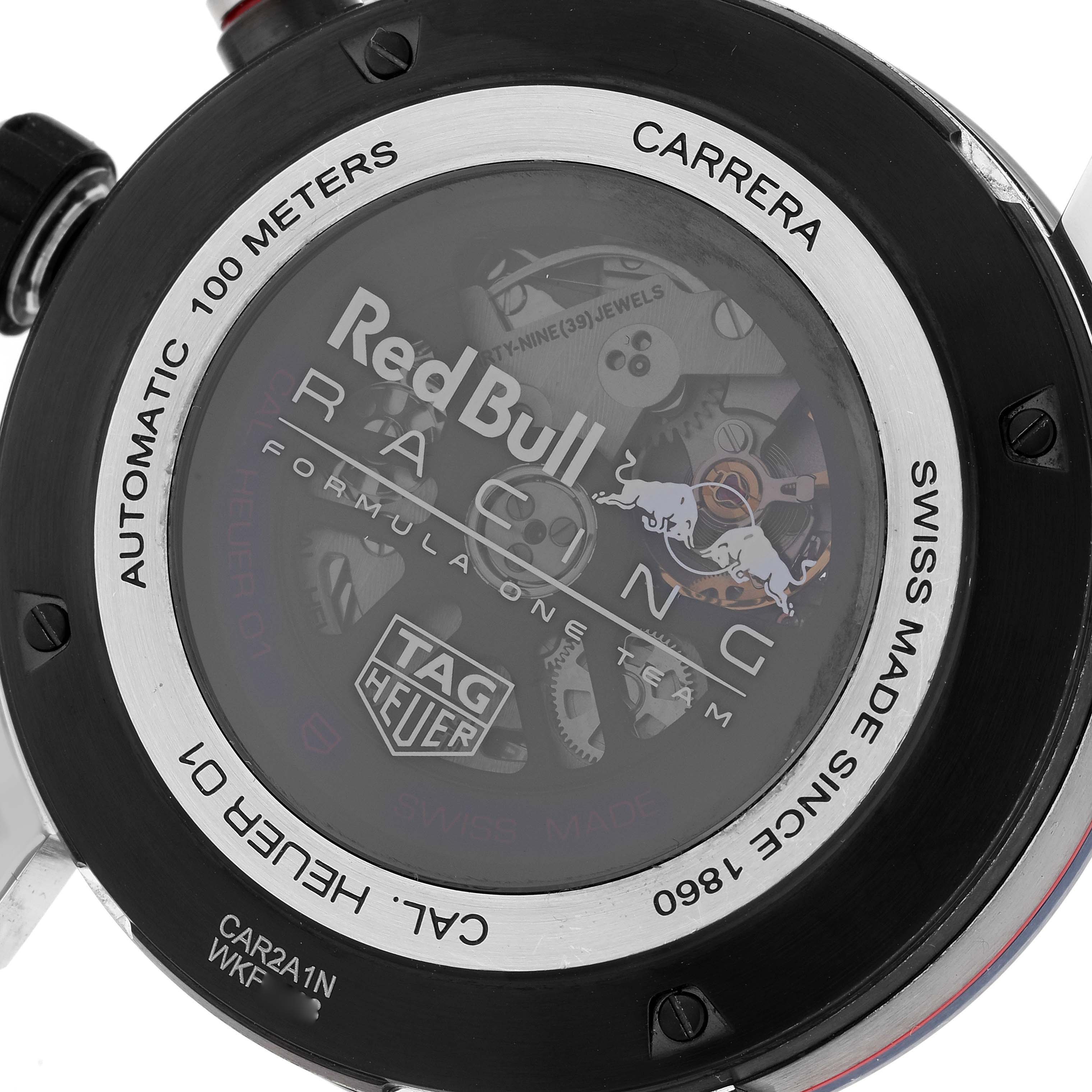 The image shows the back of a Tag Heuer Carrera CAR2A1N.FT6100 Men's Stainless Steel Blue Dial CAR2A1N.FT6100 Men's Stainless Steel Blue Dial watch, featuring the Red Bull Racing branding and visible internal mechanism.