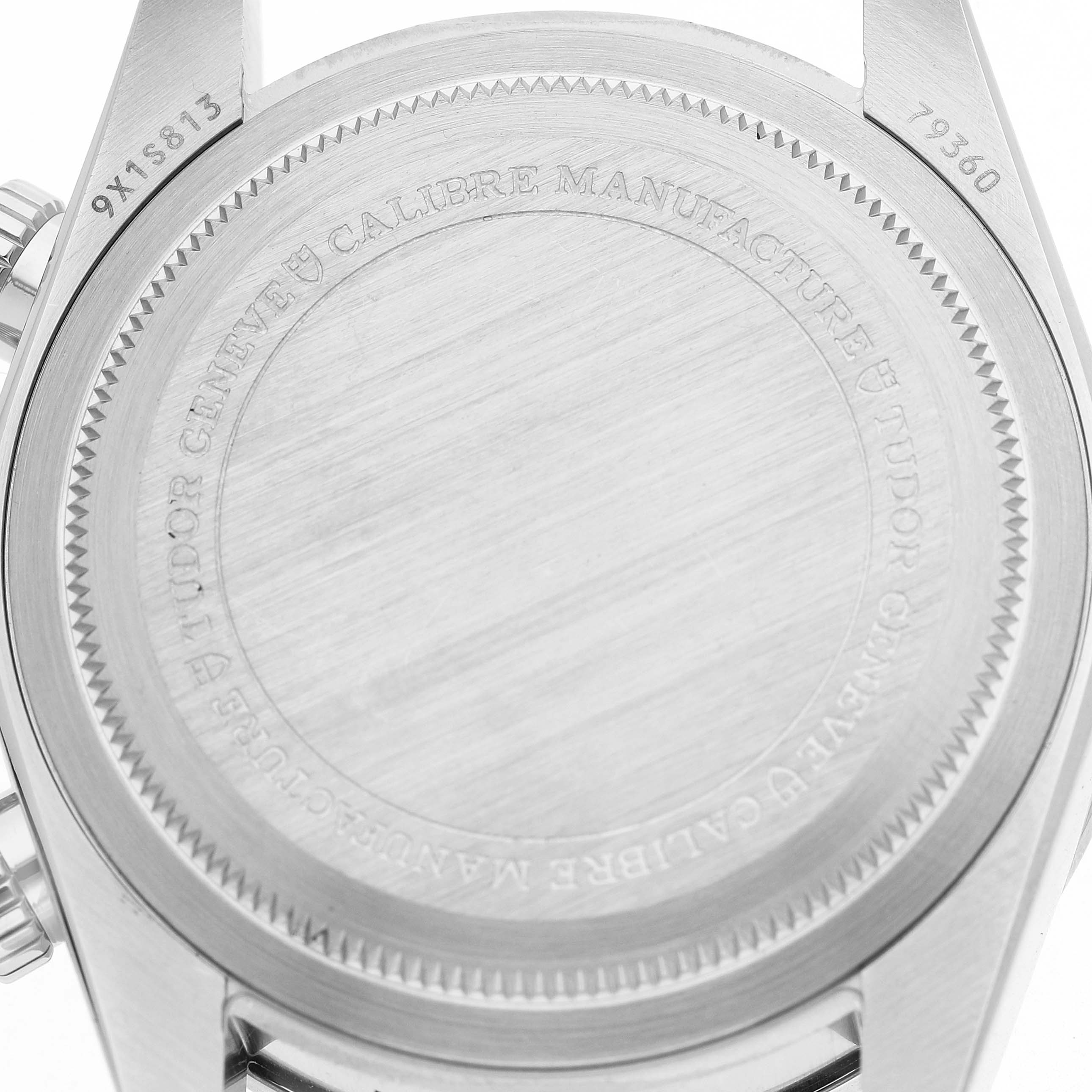 The image shows the case back of a Tudor Heritage Black Bay M79360N-0012 Men's Stainless Steel Silver Dial watch, viewed from the backside.