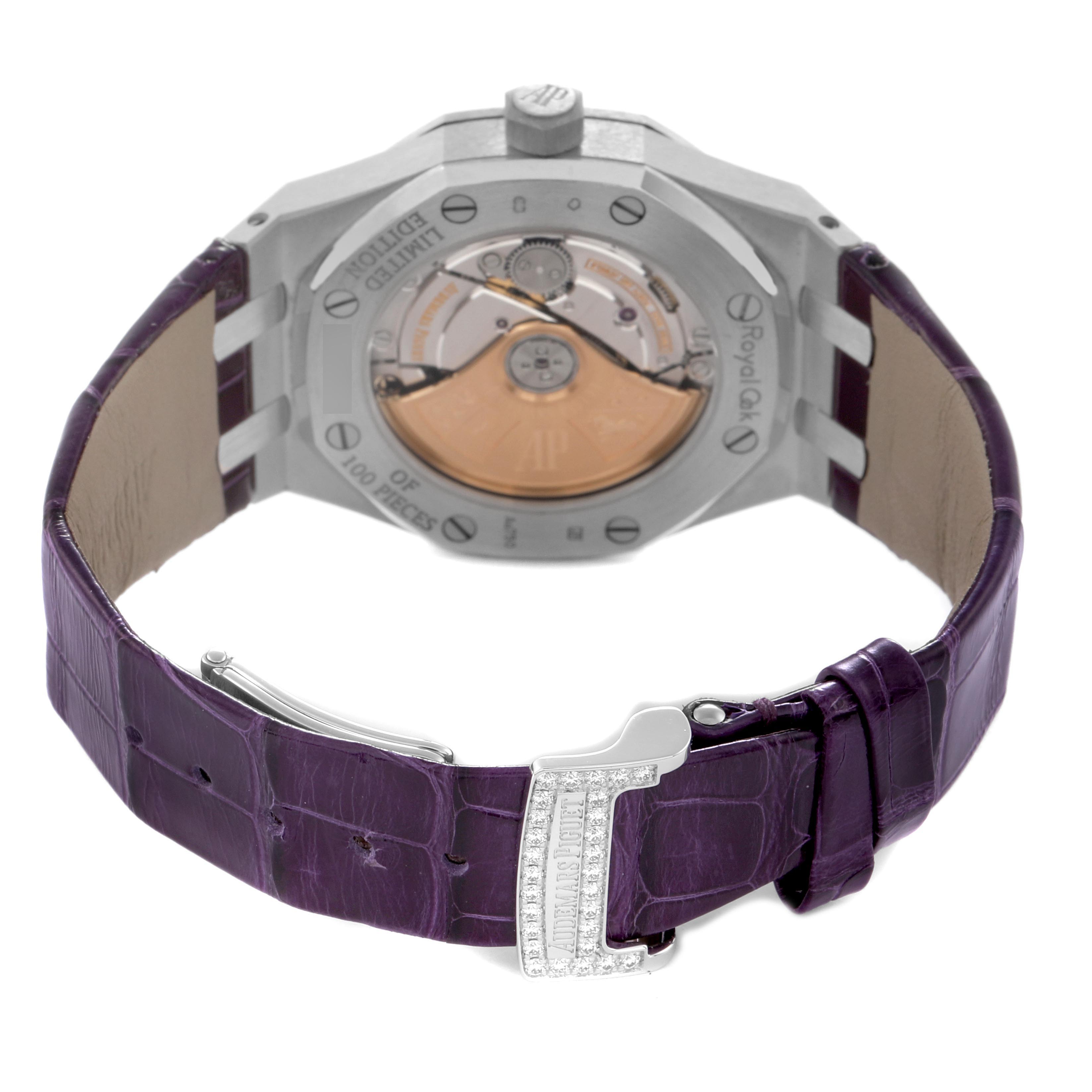 The image shows the back of an Audemars Piguet Royal Oak 15452BC.ZY.D600CR.01 Women's White Gold Purple Dial 15452BC.ZY.D600CR.01 Women's White Gold Purple Dial watch, highlighting the open case back and purple leather strap with a jeweled clasp.