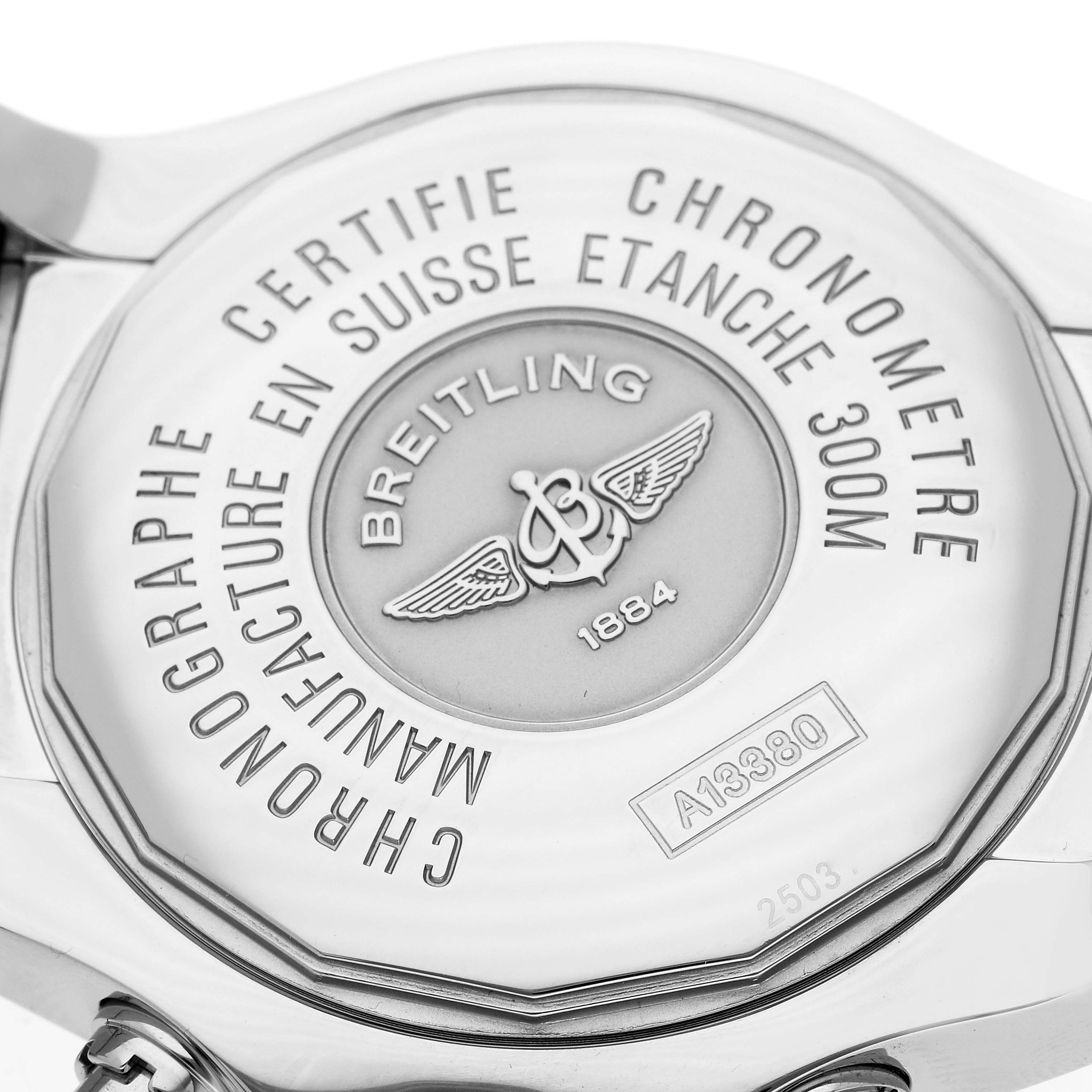 This image shows the back case of a Breitling Avenger A13380 Men's Stainless Steel Black Dial A13380 Men's Stainless Steel Black Dial watch, highlighting the brand logo and watch specifications.