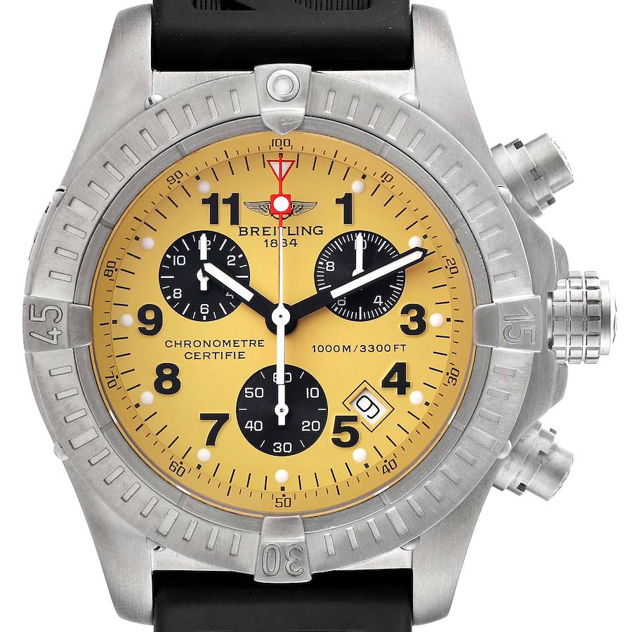 The image shows a front view of a Breitling Avenger watch with a yellow dial, black subdials, and a black strap.