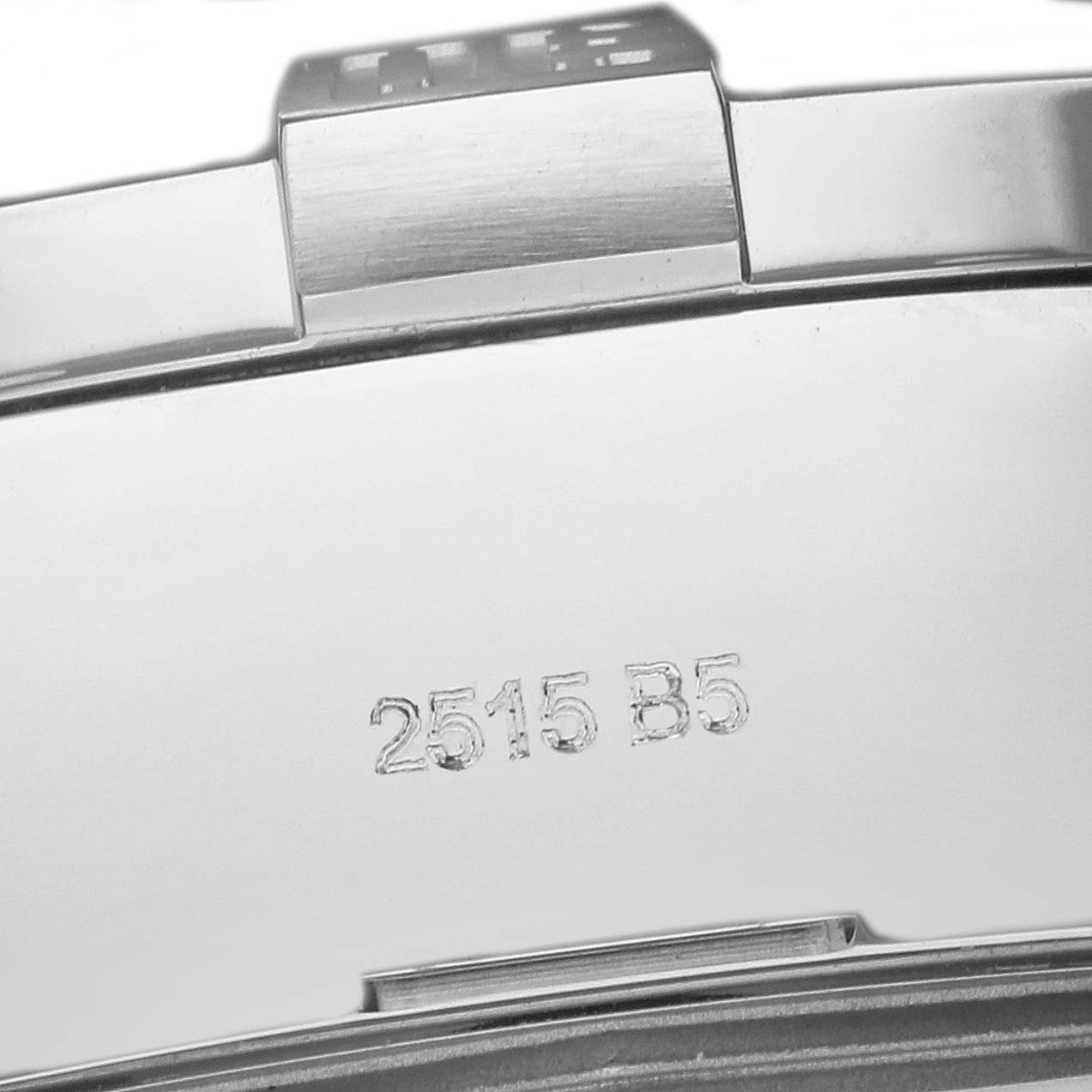 This image shows the serial number "2515 B5" engraved on the back of a Breitling Avenger A13371 Men's Stainless Steel Blue Dial A13371 Men's Stainless Steel Blue Dial watch.