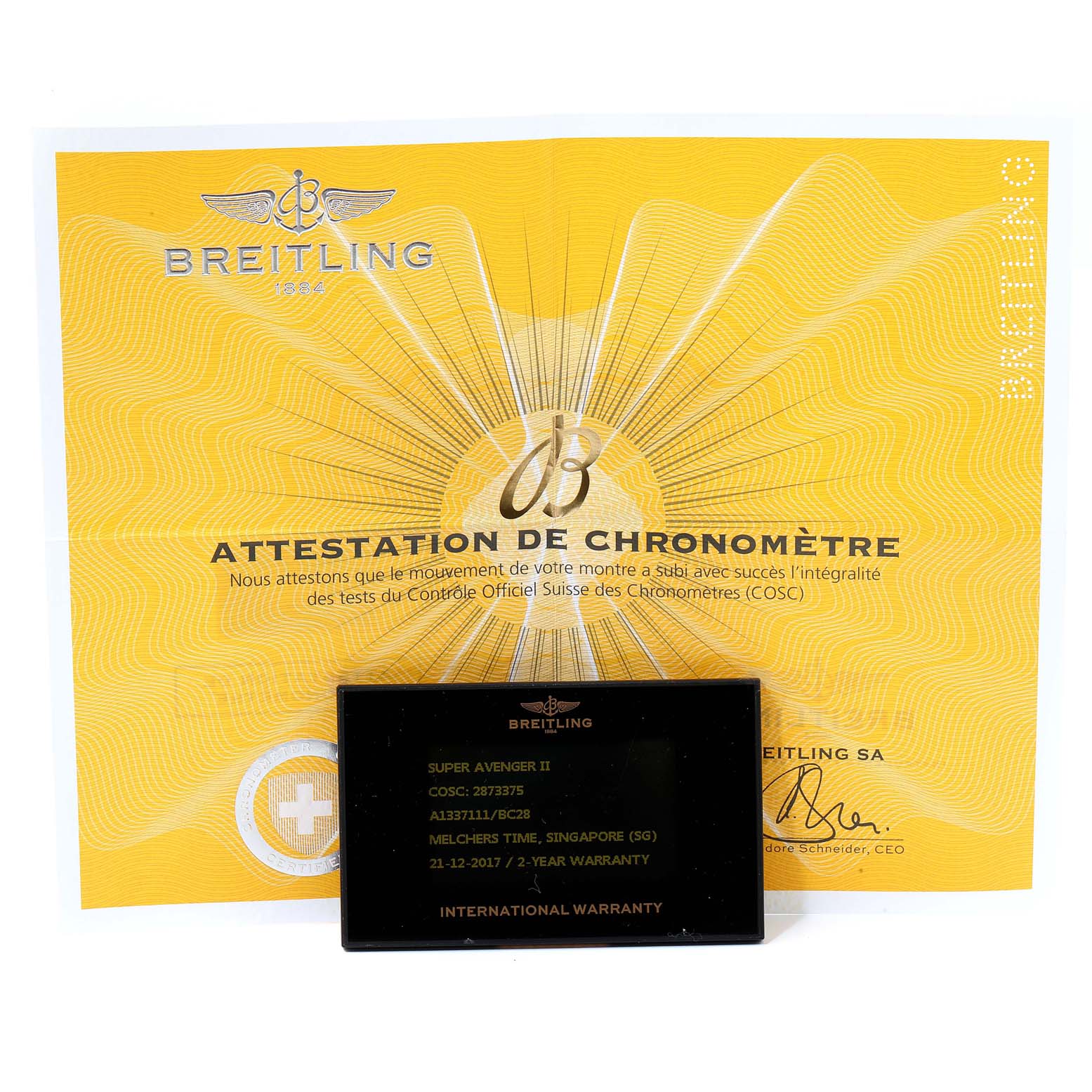 The image shows the certification and international warranty card for the Breitling Avenger A13371 Men
s Stainless Steel Black Dial A13371 Men
s Stainless Steel Black Dial model.