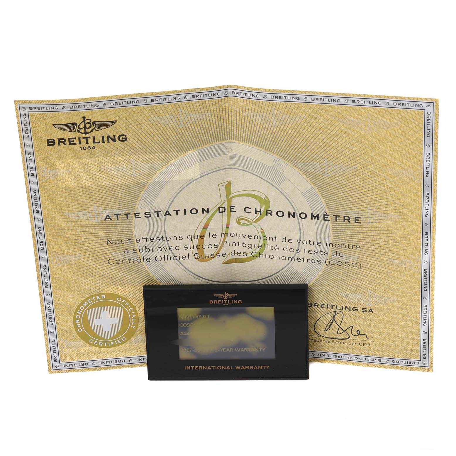 The image shows certification and warranty documents for the Bentley model by Breitling, including a chronometer certificate.