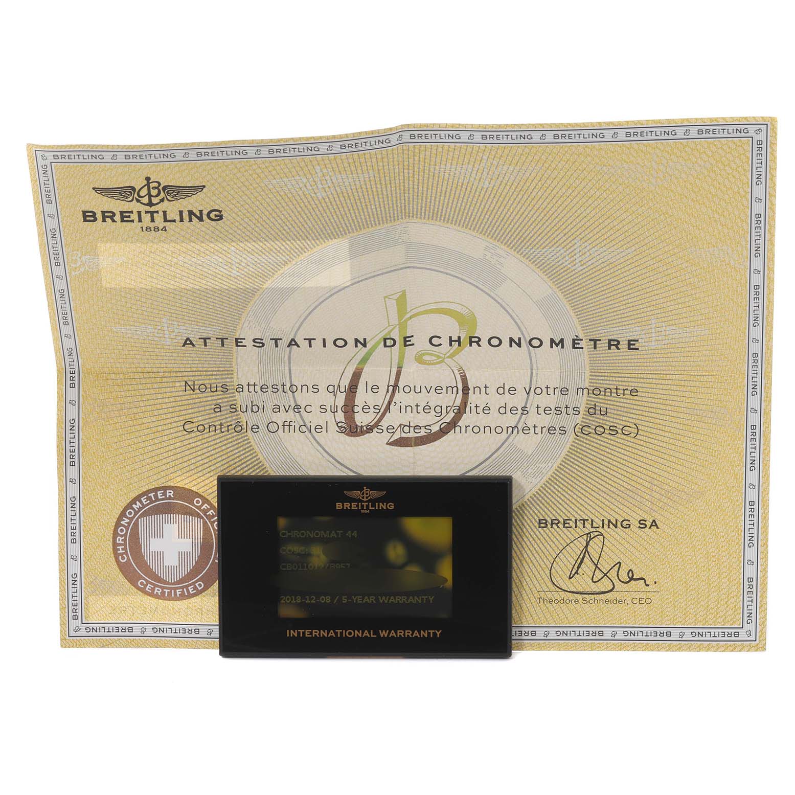 The image shows a Breitling Chronomat CB011012/B957 Men's Stainless Steel Champagne Dial CB011012/B957 Men's Stainless Steel Champagne Dial model's chronometer certificate and an international warranty card.