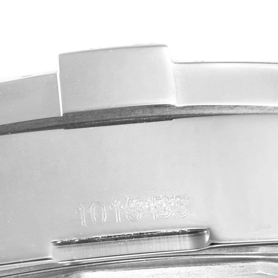 This image shows the side view of a Breitling Colt A17388 Men's Stainless Steel White Dial A17388 Men's Stainless Steel White Dial watch's bezel and casing, including the engraved numbers.
