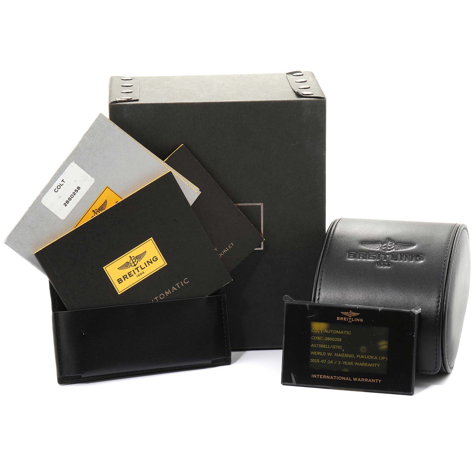 The image shows the Breitling Colt A17388 Men's Stainless Steel White Dial A17388 Men's Stainless Steel White Dial watch accessories, including manuals, warranty card, box, and carrying case.