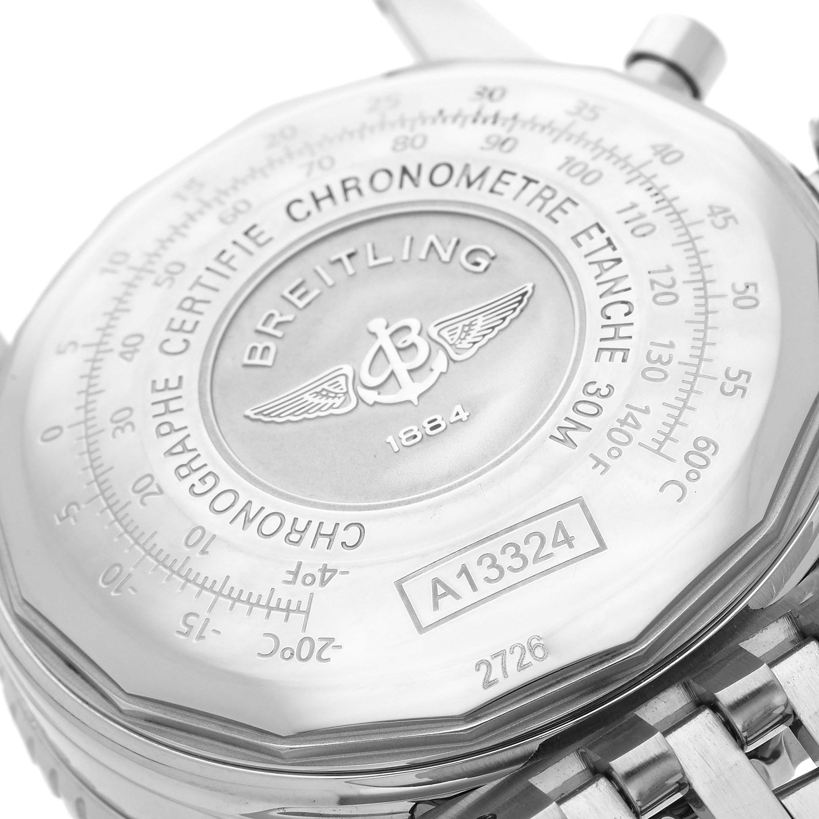 The image shows the back of a Breitling Navitimer A1332412/BD49 Men's Stainless Steel Black Dial A1332412/BD49 Men's Stainless Steel Black Dial watch, highlighting the engraved logo, serial number, and chronometer details.