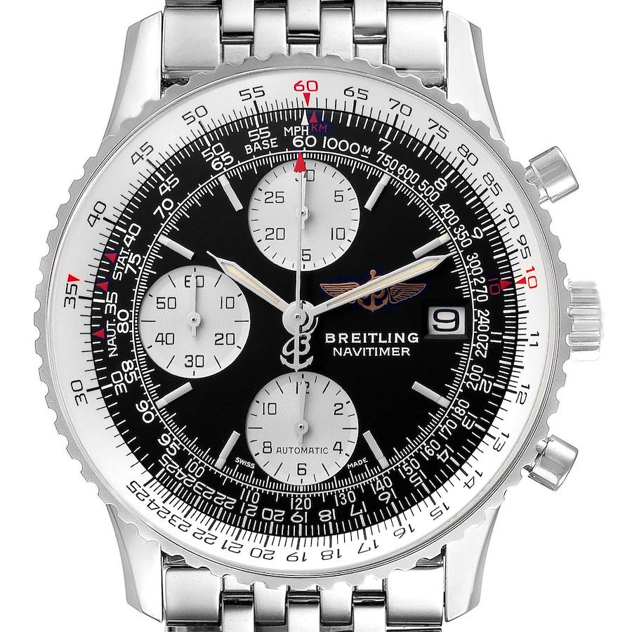 The Breitling Navitimer watch is shown in a top-down angle, highlighting its face, sub-dials, and part of the metal bracelet.