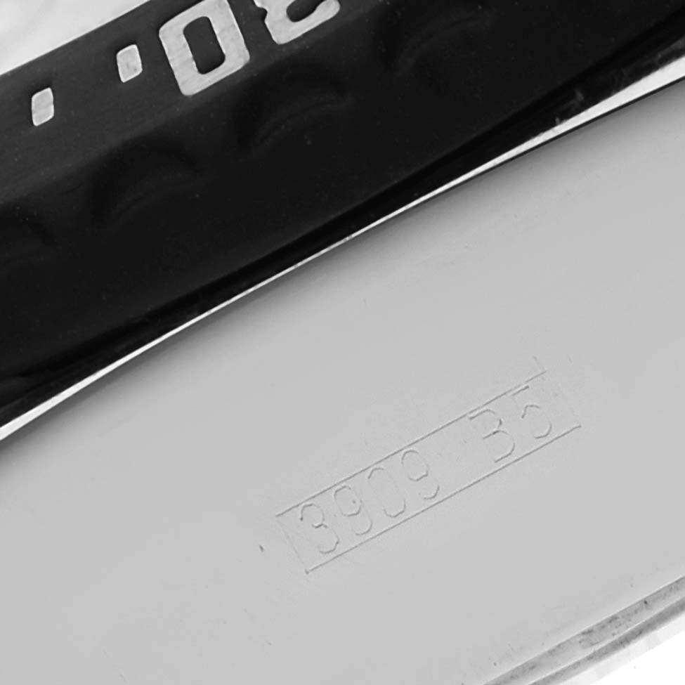 The image shows a close-up of the bezel and side casing of a Breitling Professional Series A27364 Men's Stainless Steel Silver Dial A27364 Men's Stainless Steel Silver Dial watch, featuring part of the serial number.