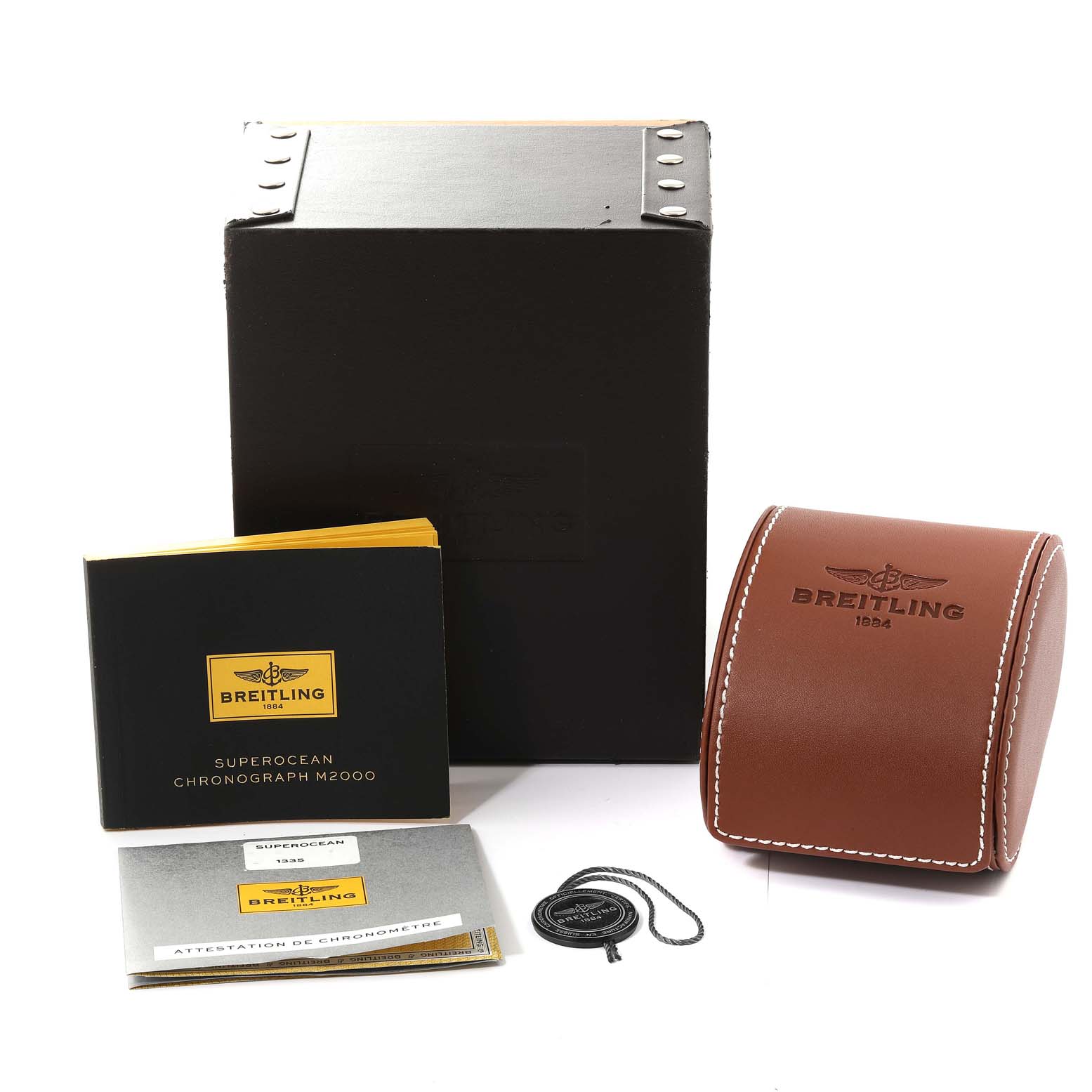The image shows the box, case, manuals, and tag of the Breitling Superocean A73310 Men's Stainless Steel Black Dial A73310 Men's Stainless Steel Black Dial model watch.