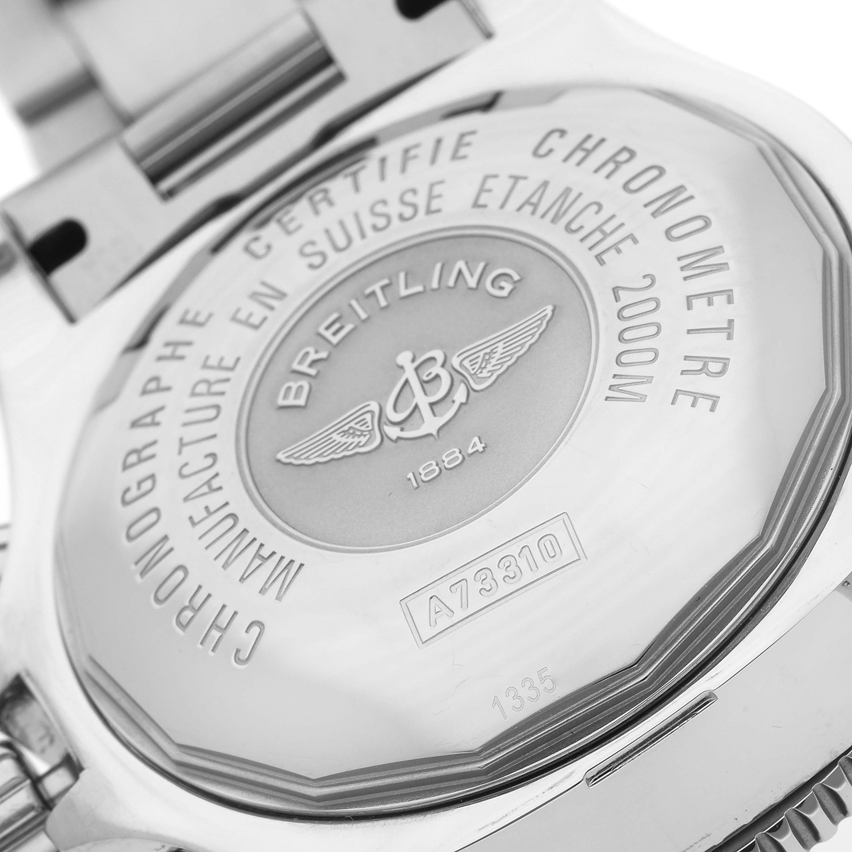 This image shows the back of a Breitling Superocean A73310 Men's Stainless Steel Black Dial A73310 Men's Stainless Steel Black Dial watch, displaying branding, model details, and specifications.