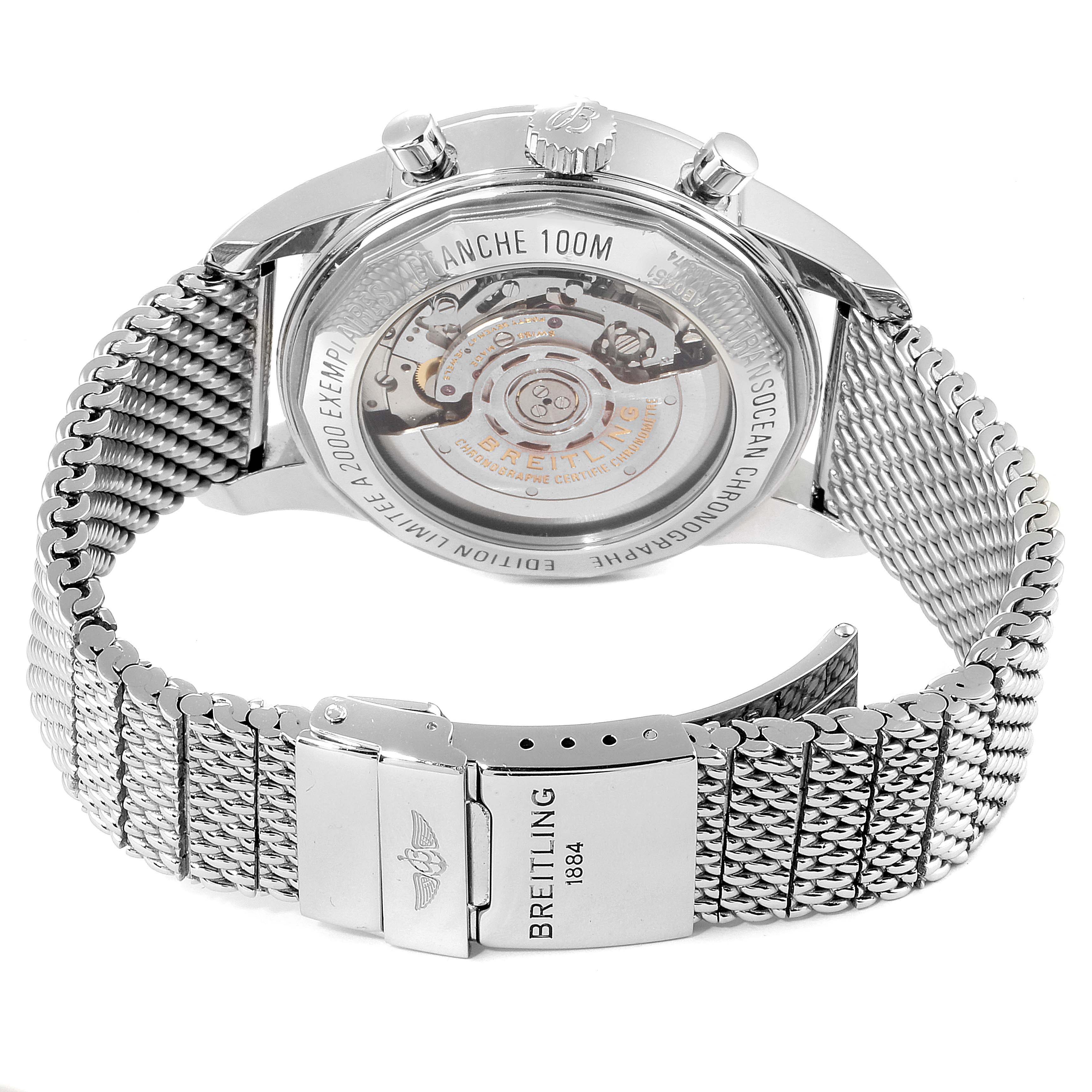 This image shows the back view of a Breitling Transocean AB0451 Men
s Stainless Steel Black Dial AB0451 Men
s Stainless Steel Black Dial watch, highlighting its mechanical movement and stainless steel mesh bracelet.