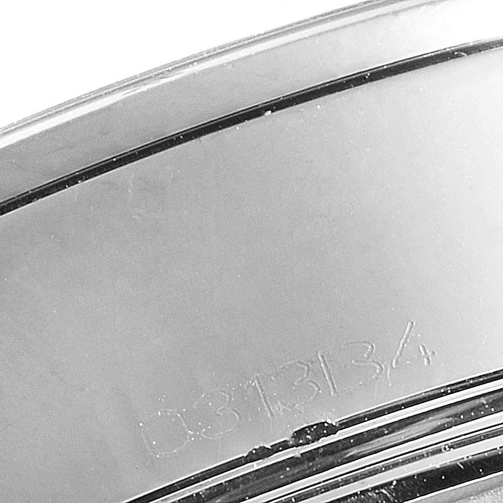 The image shows a close-up of the back casing with some engraving of the Breitling Transocean AB0451 Men
s Stainless Steel Black Dial AB0451 Men
s Stainless Steel Black Dial watch.