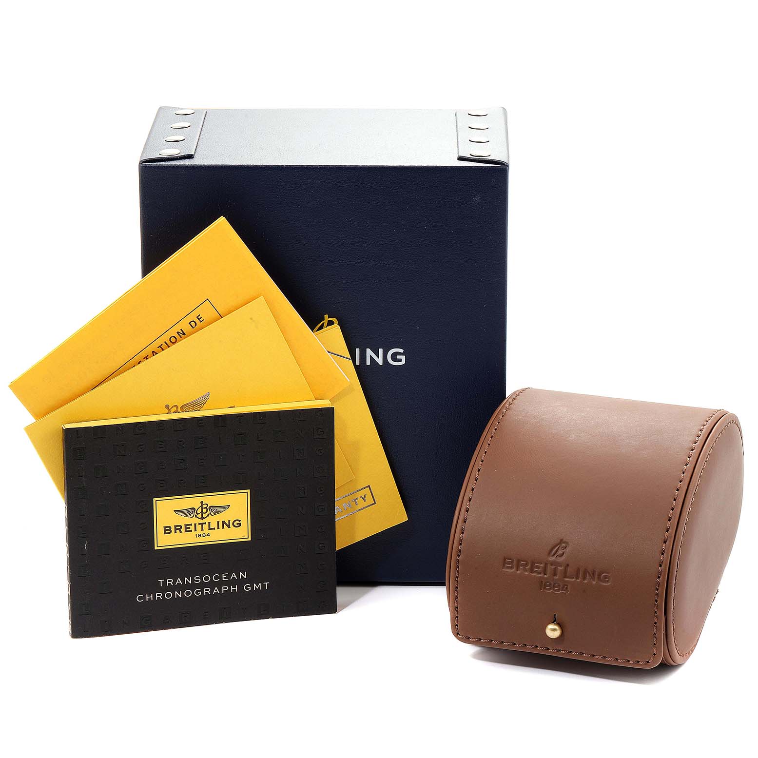 The image shows a Breitling Transocean AB0451 Men
s Stainless Steel Black Dial AB0451 Men
s Stainless Steel Black Dial watch box, documentation, and a leather case from a straight-on angle.