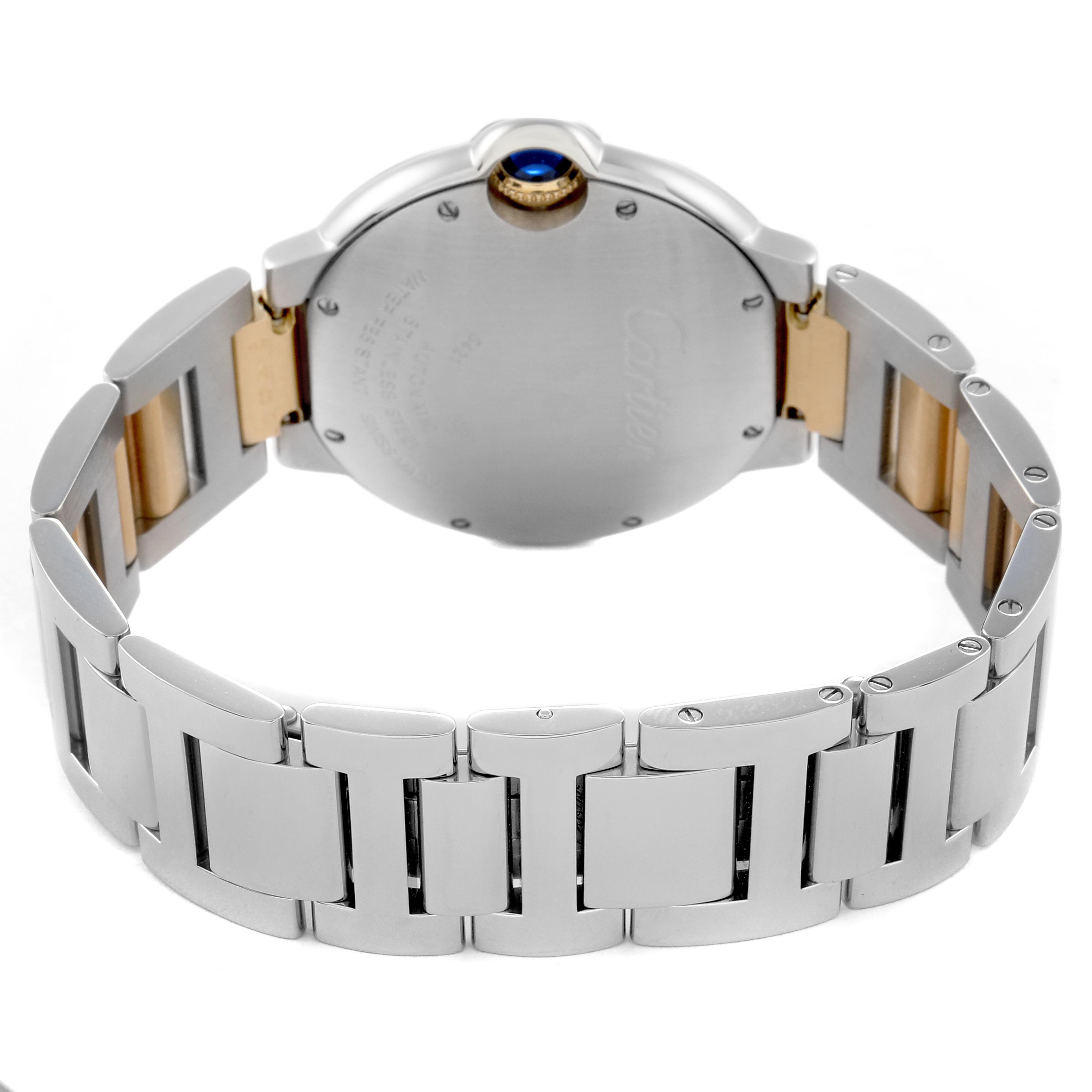 The image shows the back of the Ballon Bleu by Cartier, highlighting the bracelet and case back.