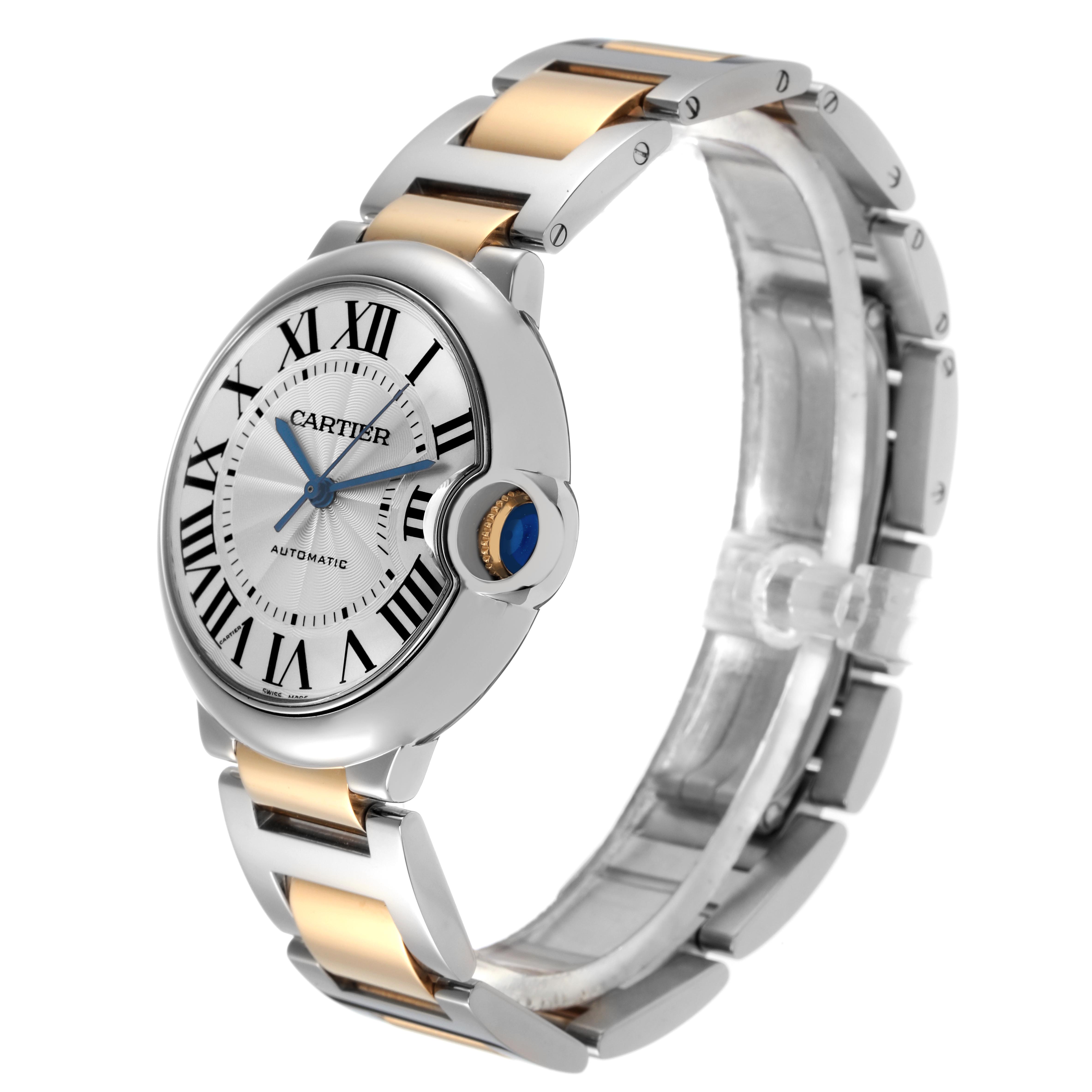 The Cartier Ballon Bleu W2BB0012 Women's Steel and Gold (two tone) Silver Dial W2BB0012 Women's Steel and Gold (two tone) Silver Dial watch is shown at a three-quarter angle, highlighting the face, crown, and part of the two-tone bracelet.