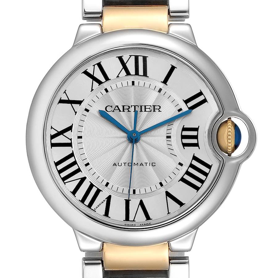 The Cartier Ballon Bleu watch is shown from the front, highlighting the dial, Roman numerals, and the distinctive crown.
