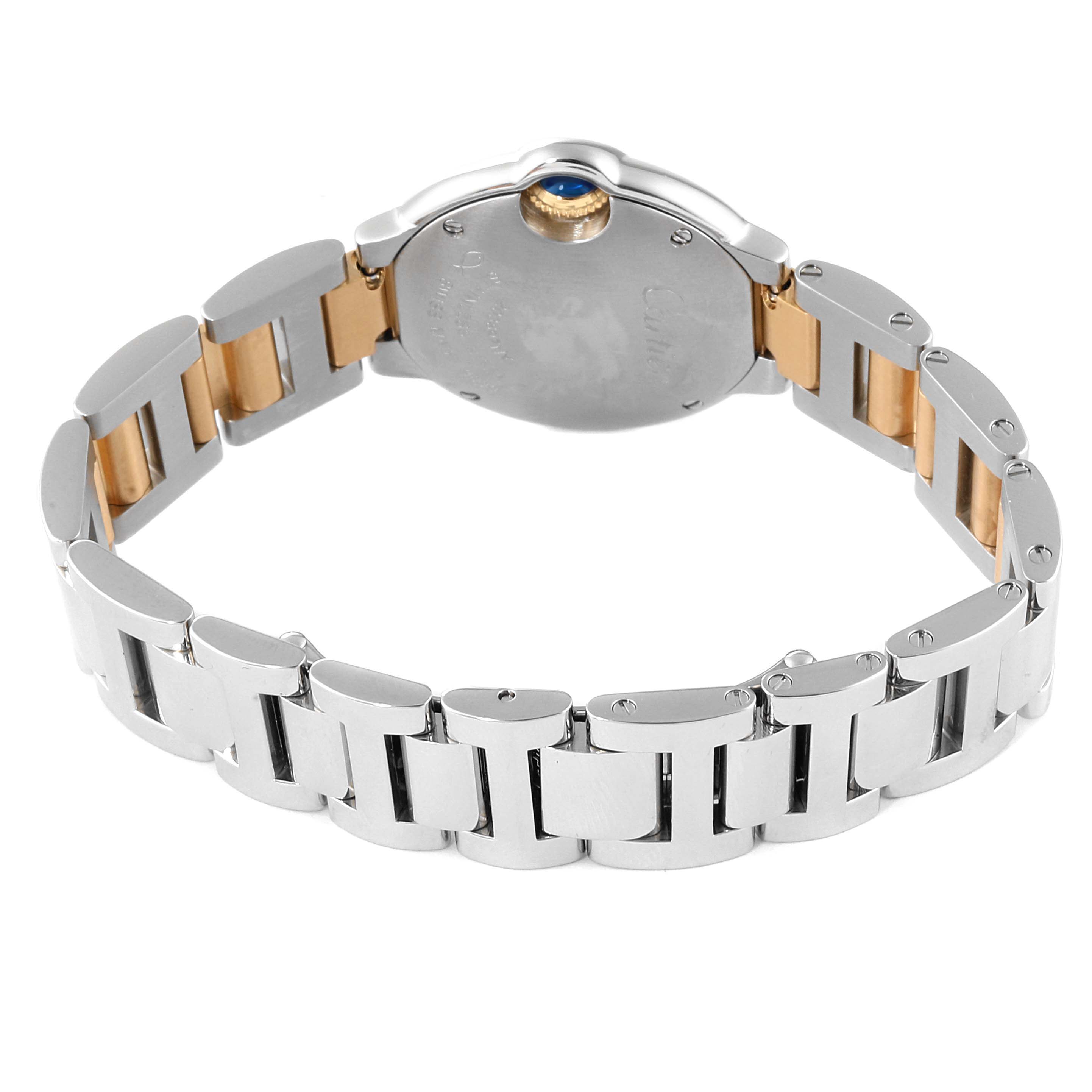 The image shows the back and bracelet of a Cartier Ballon Bleu W69007Z3 Women
s Steel and Gold (two tone) Silver Dial W69007Z3 Women
s Steel and Gold (two tone) Silver Dial watch, highlighting its silver and gold two-tone metal band.