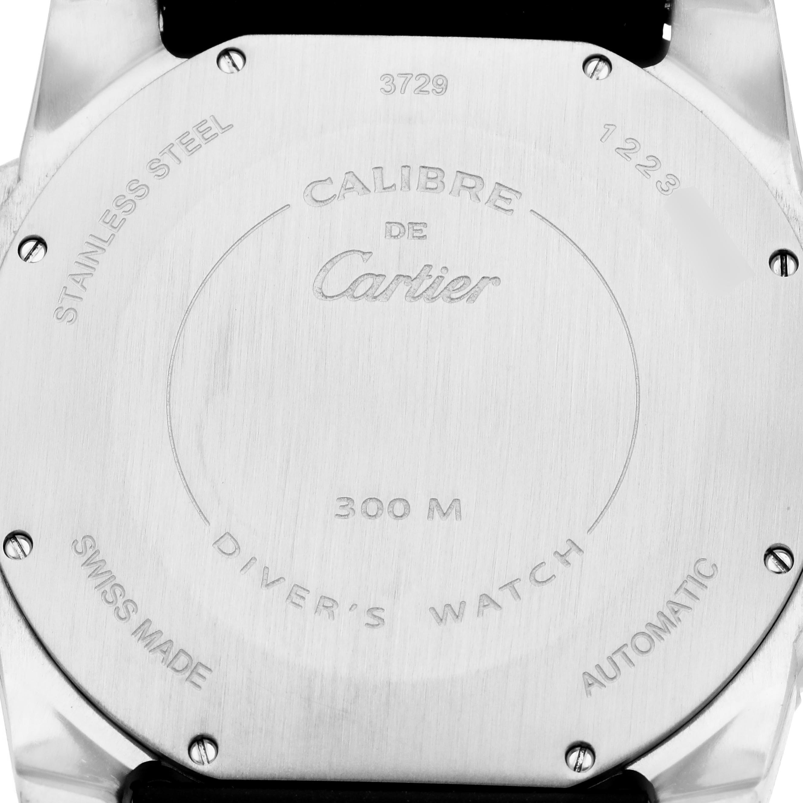 The image shows the back case of a Calibre de Cartier watch, highlighting its stainless steel material and engravings.
