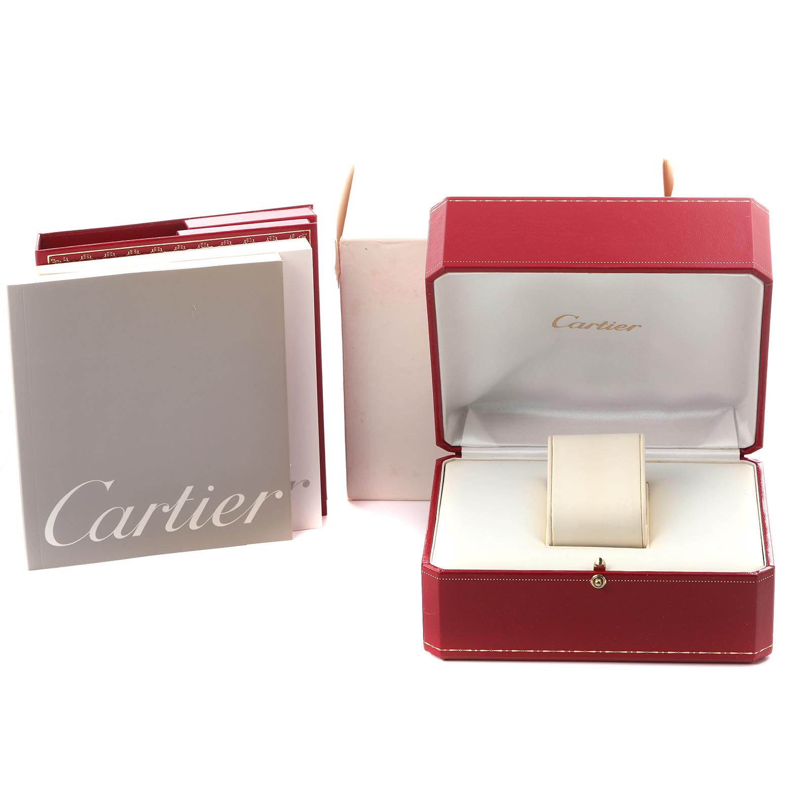 The image shows a Cartier Roadster WE500160 Women
s Yellow Gold Silver Dial WE500160 Women
s Yellow Gold Silver Dial watch box and accessories, including the red watch case and branded booklets.