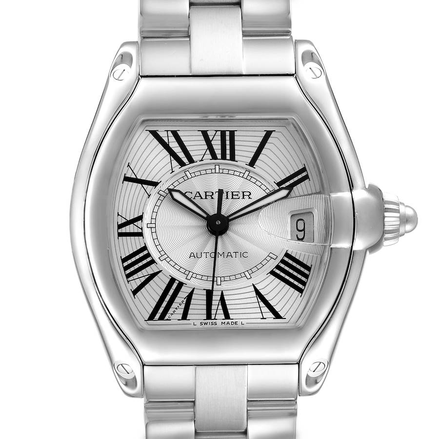 The Cartier Roadster watch is shown from a front angle, highlighting its dial, Roman numerals, date, and bracelet.