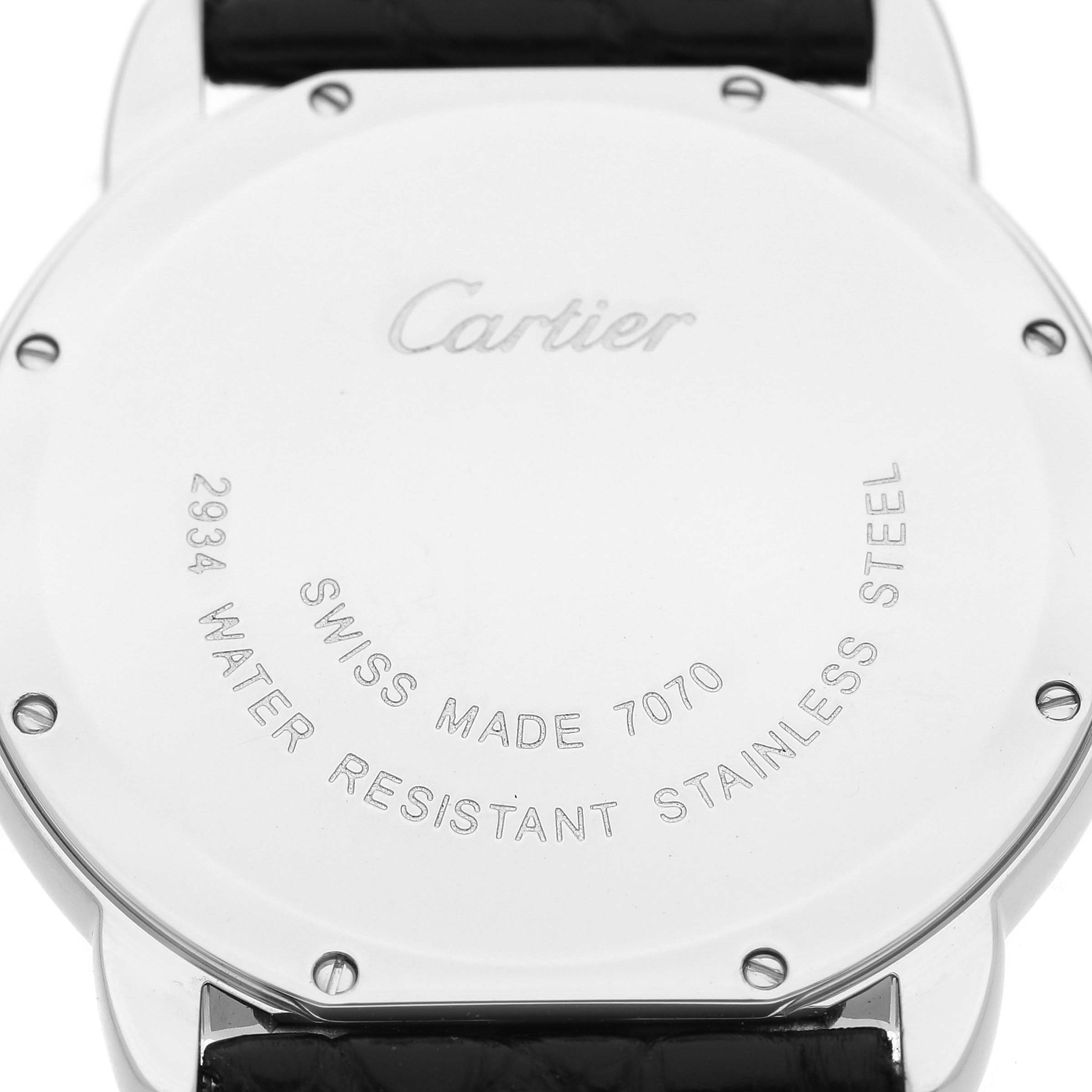 The image shows the back case of the Cartier Ronde W6700255 Men's Stainless Steel Silver Dial model watch, highlighting the brand engraving and serial details.