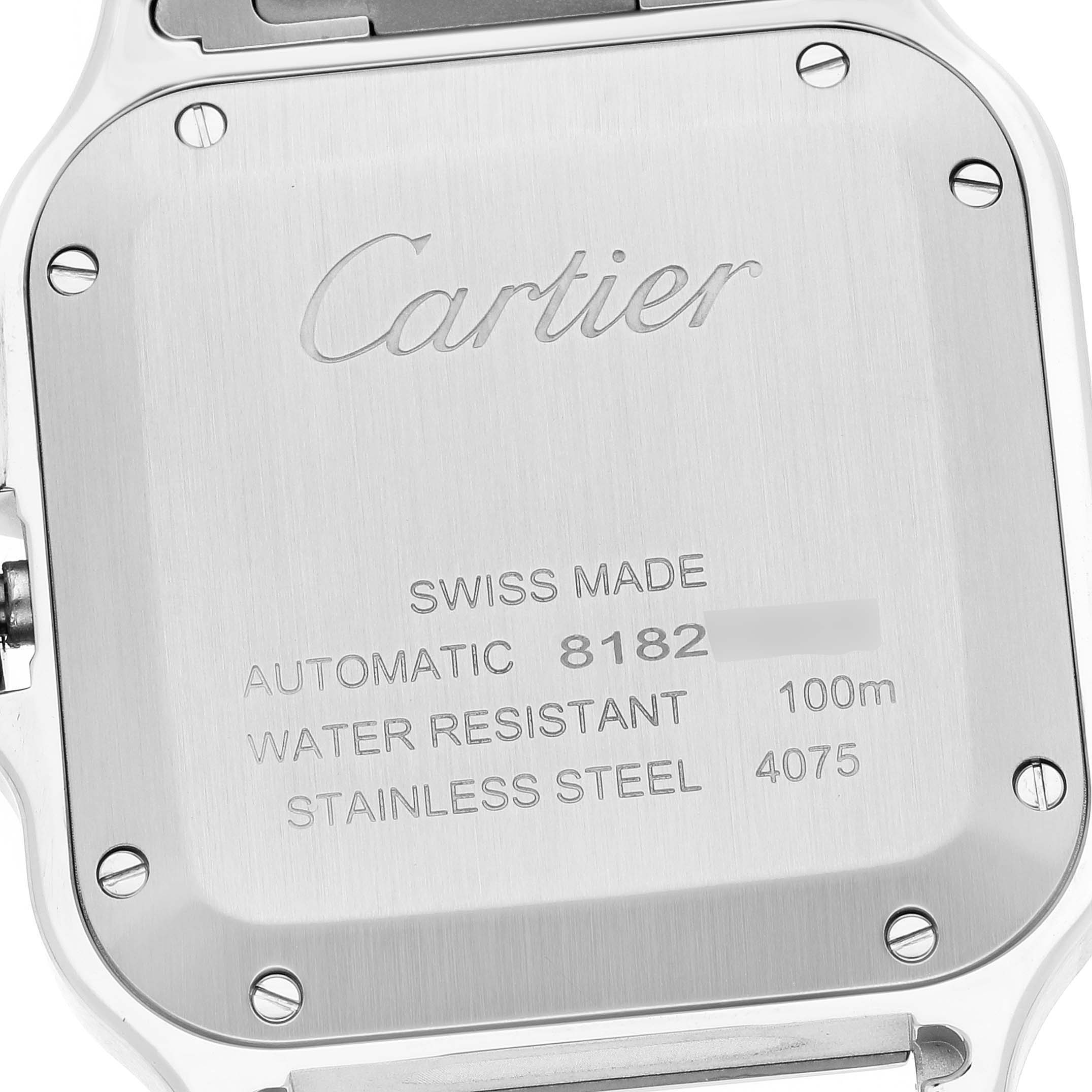 The image shows the back case of a Cartier Santos WSSA0029 Men
s Stainless Steel Silver Dial WSSA0029 Men
s Stainless Steel Silver Dial watch, displaying the brand name and specifications.