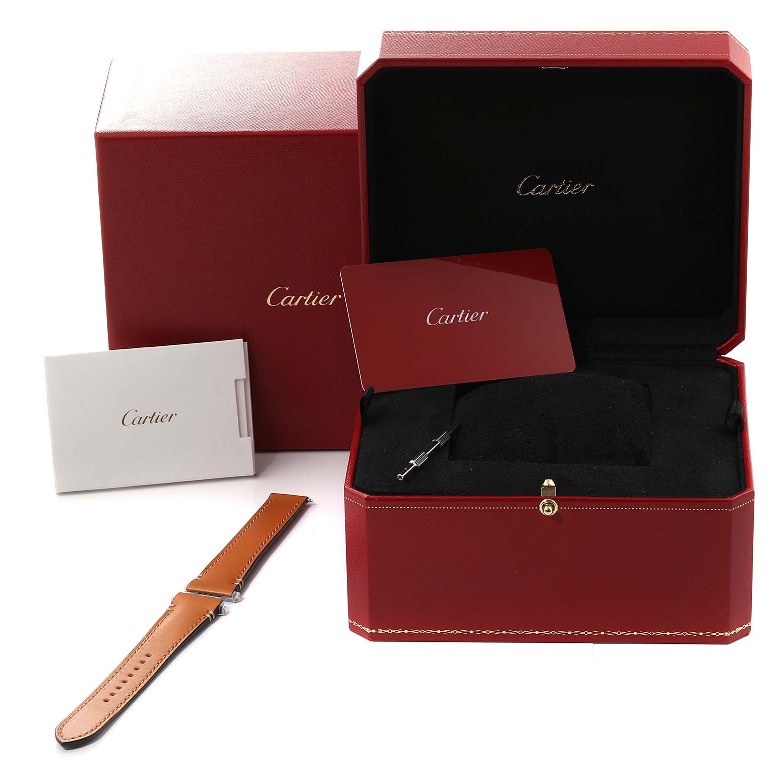 This image shows the packaging, a spare strap, and documents for a Cartier Santos WSSA0029 Men
s Stainless Steel Silver Dial WSSA0029 Men
s Stainless Steel Silver Dial watch.