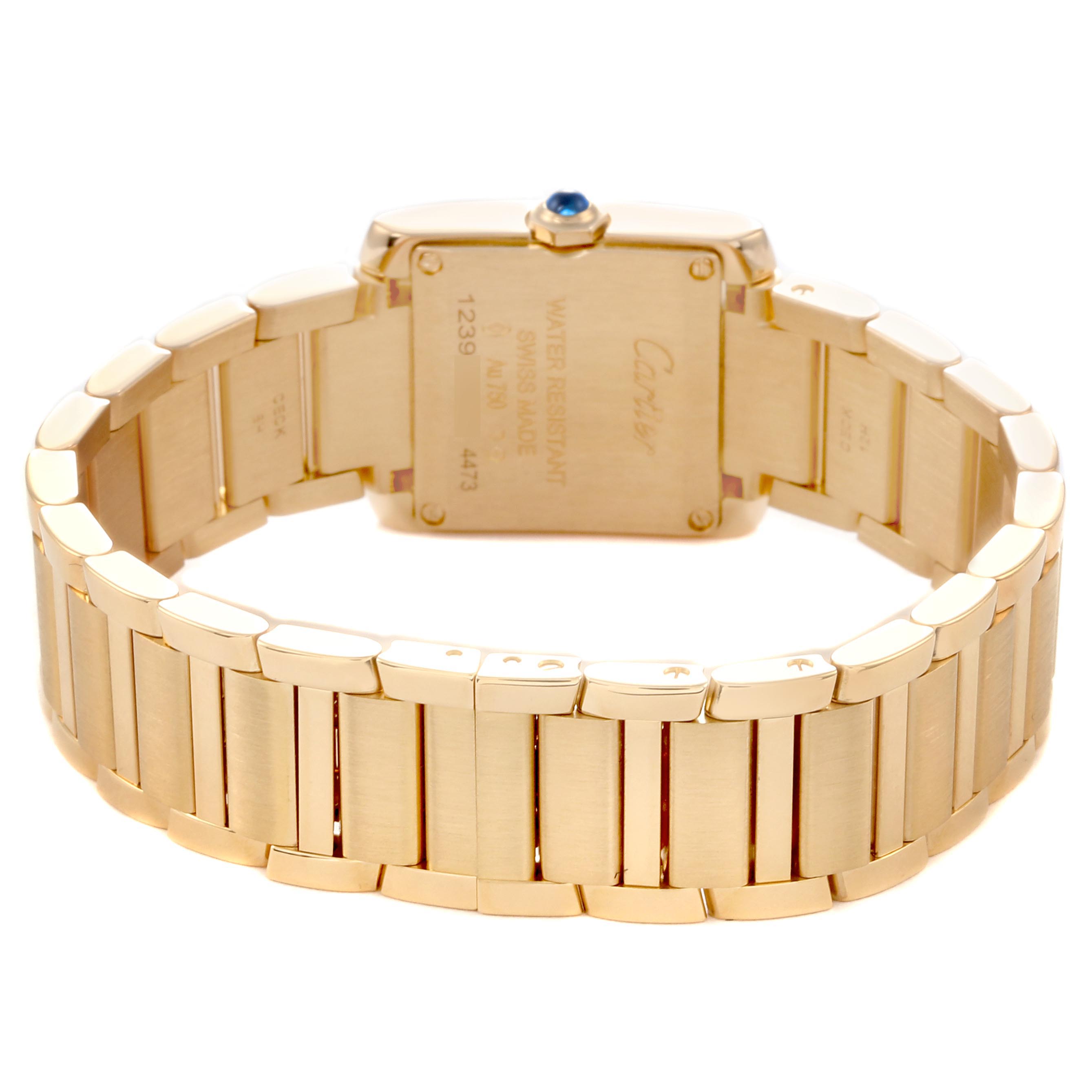 The image shows the Cartier Tank Française model from the back, highlighting the case back and gold bracelet links.