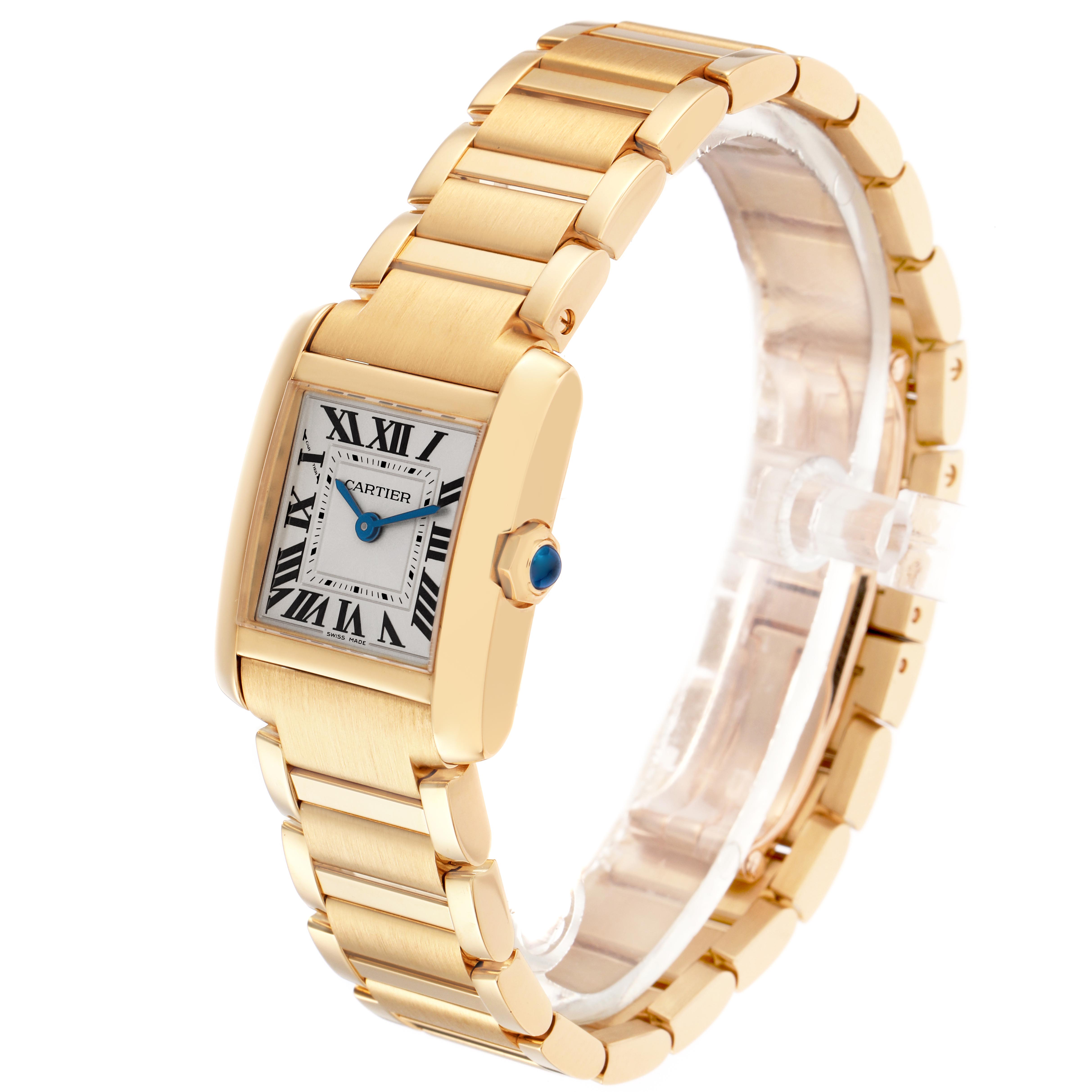 The Cartier Tank Française watch is shown at an angled view displaying its rectangular face, Roman numerals, and linked bracelet.