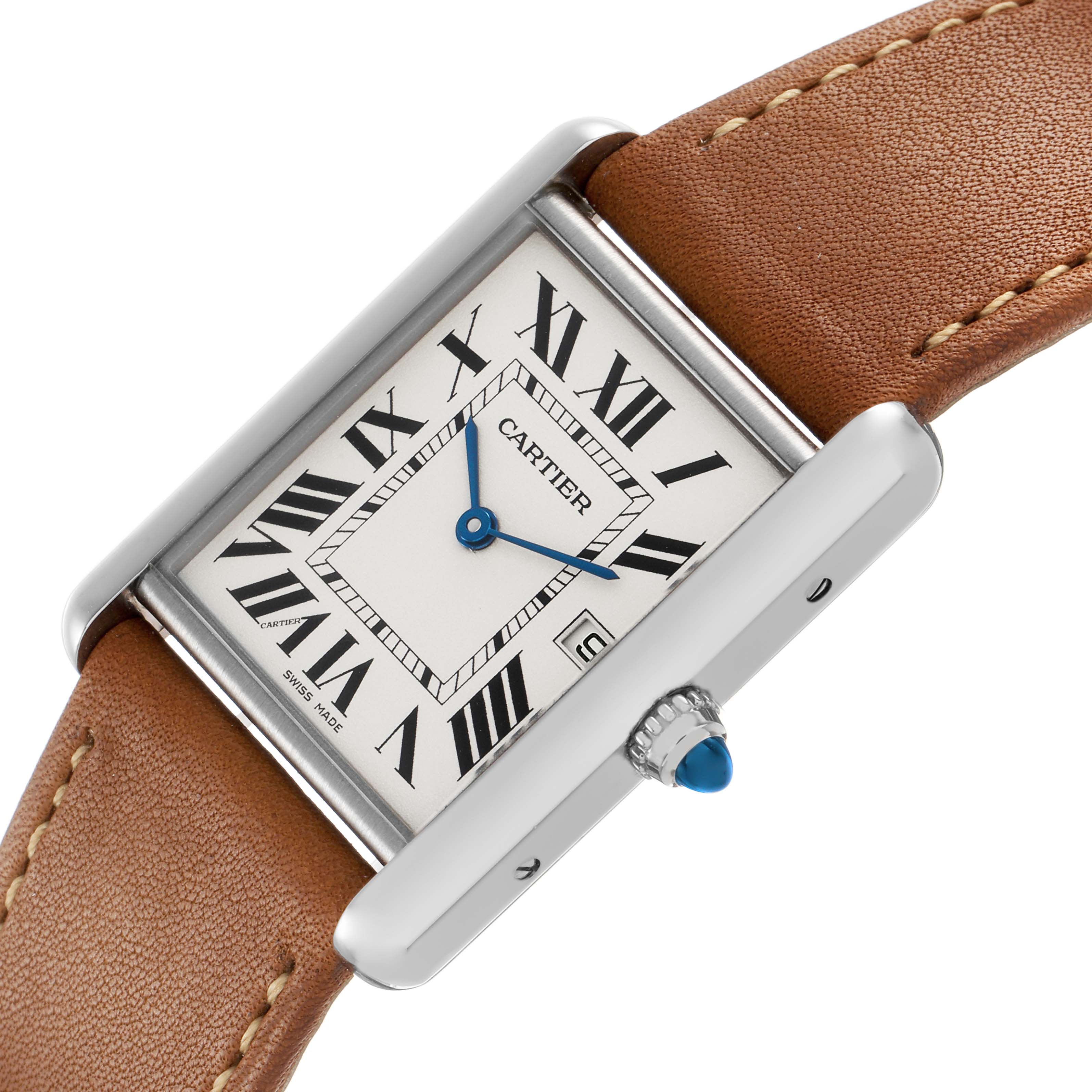 The Cartier Tank Louis W1540956 Men's White Gold Silver Dial watch is shown at an angled view, displaying its rectangular case, brown leather strap, and round crown with a blue cabochon.