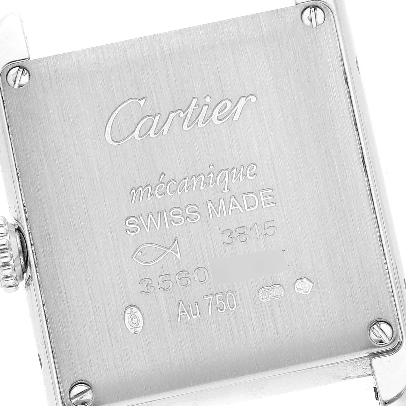The image shows the back of a Tank Louis watch by Cartier, detailing inscriptions and markings.