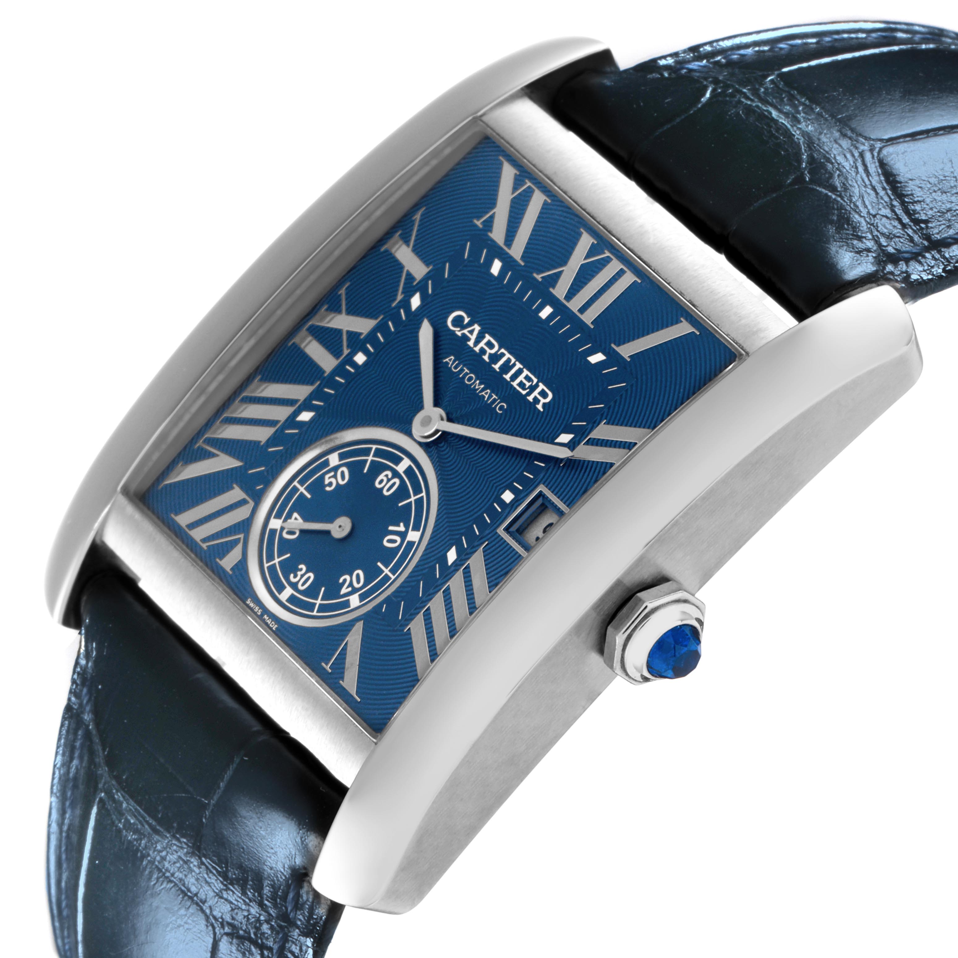 The Cartier Tank MC WSTA0010 Men's Stainless Steel Blue Dial WSTA0010 Men's Stainless Steel Blue Dial watch is shown angled, displaying the blue dial, Roman numerals, subdial, and crown.