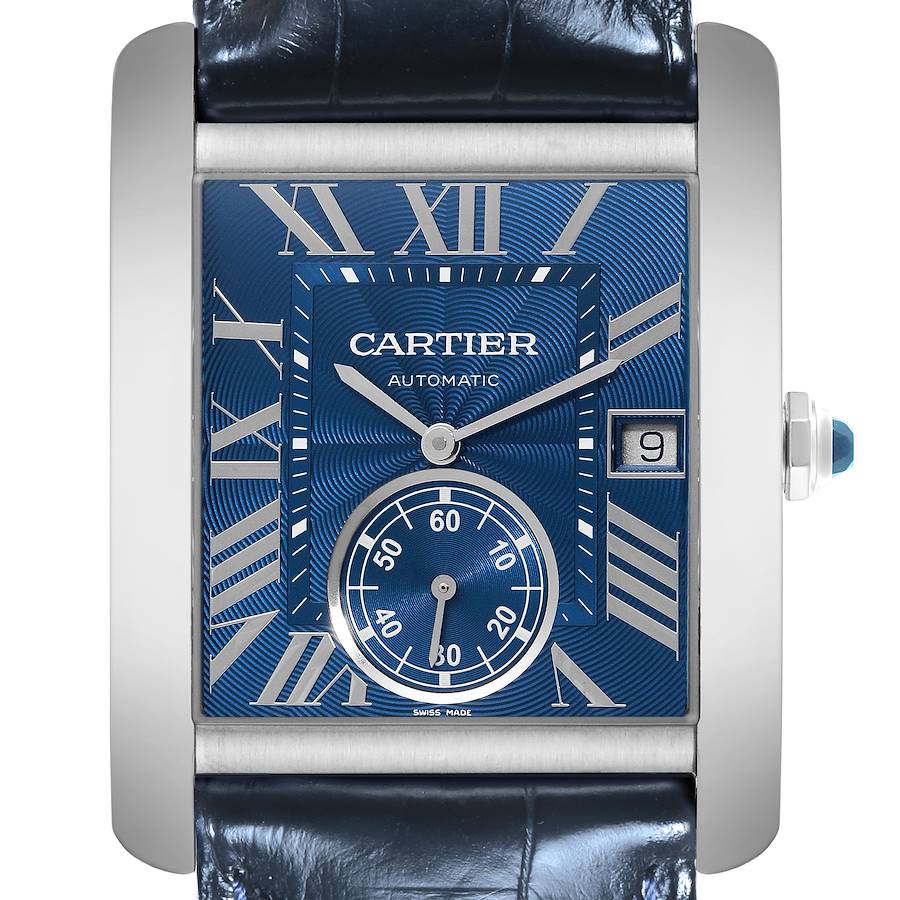 The Cartier Tank MC watch is shown from the front, featuring a blue dial, Roman numerals, date window, and leather strap.