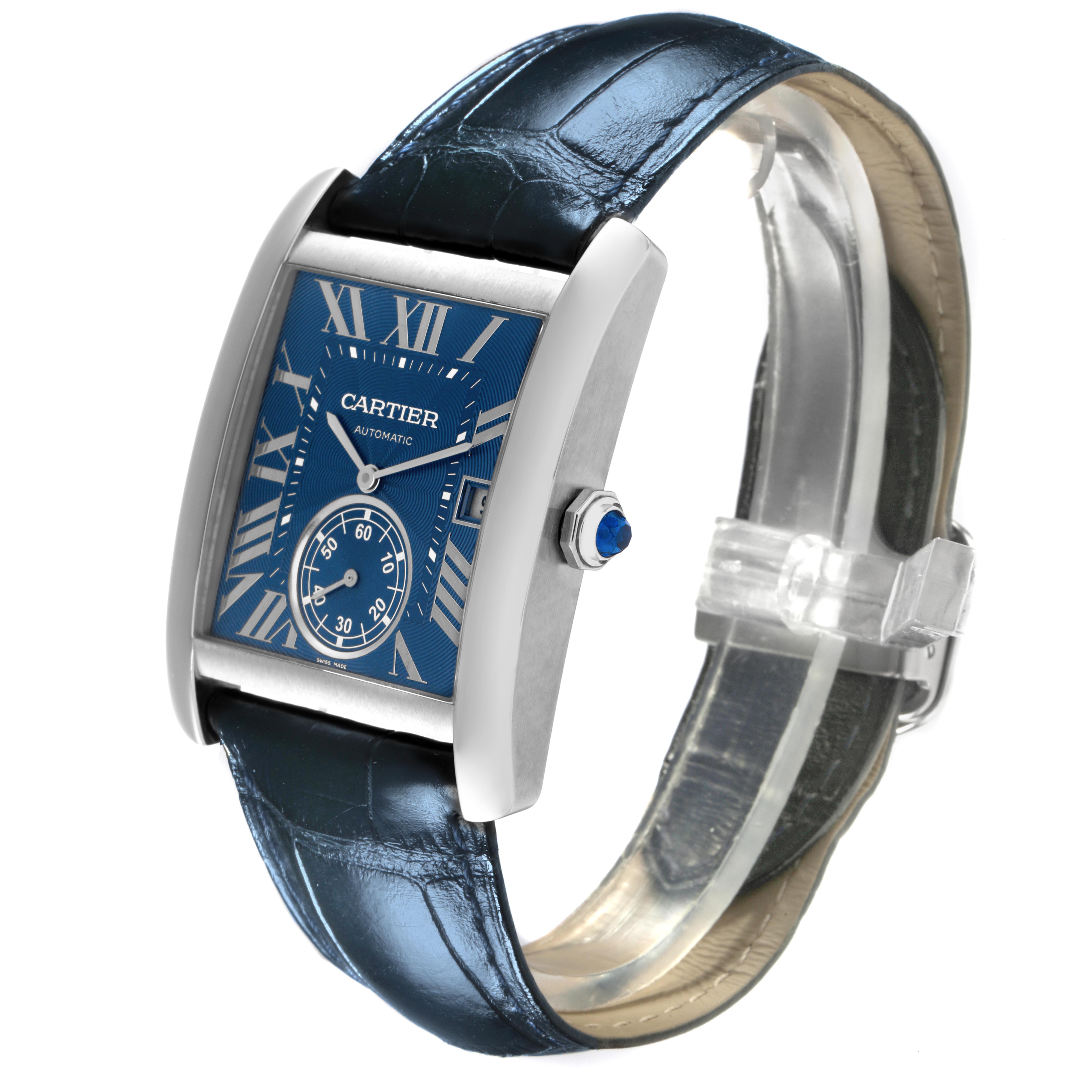 The Cartier Tank MC WSTA0010 Men's Stainless Steel Blue Dial WSTA0010 Men's Stainless Steel Blue Dial watch is shown at a three-quarter angle, displaying the face, strap, crown, and side profile.