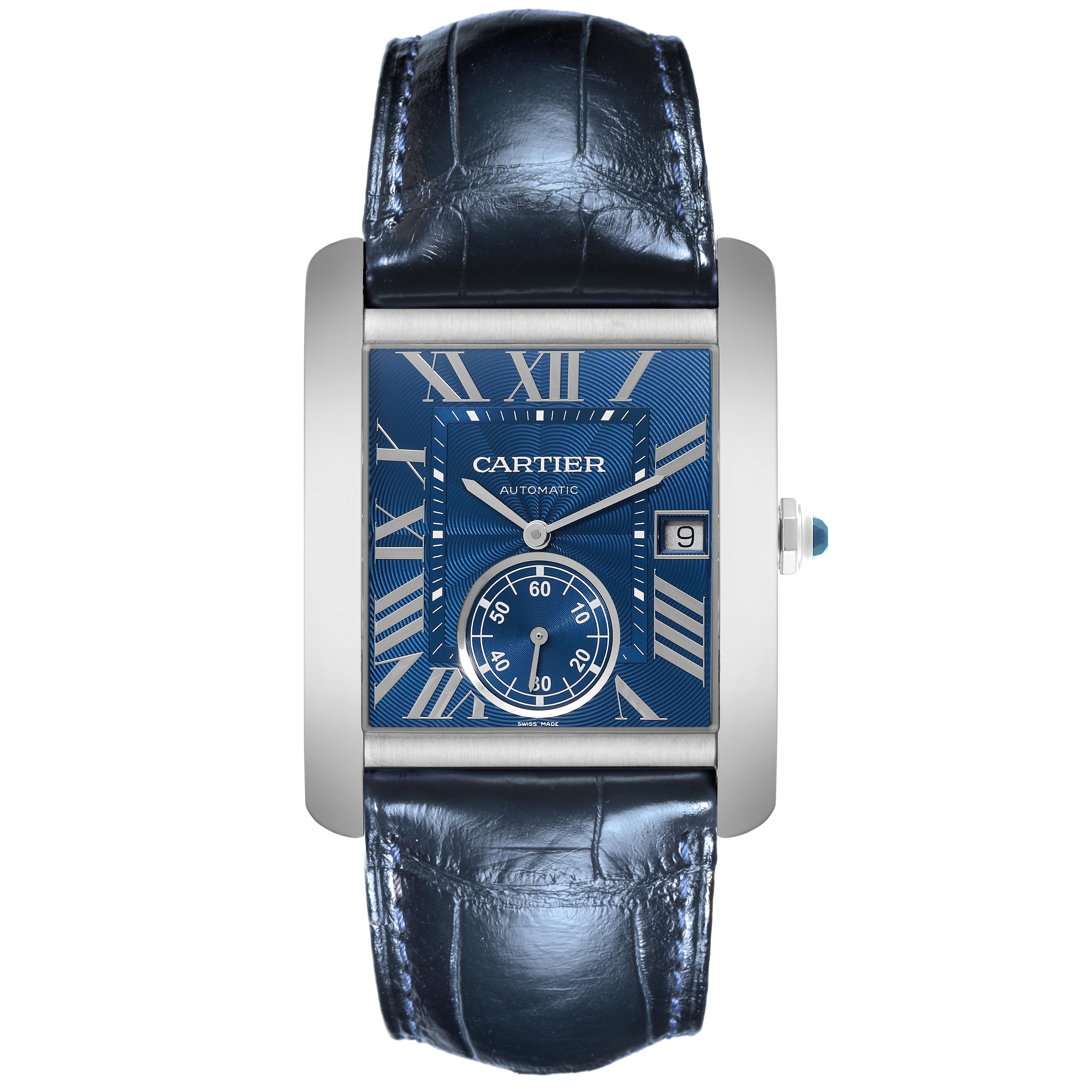 The Cartier Tank MC WSTA0010 Men's Stainless Steel Blue Dial WSTA0010 Men's Stainless Steel Blue Dial watch is shown from a top-down angle, highlighting the blue dial, Roman numerals, and leather strap.