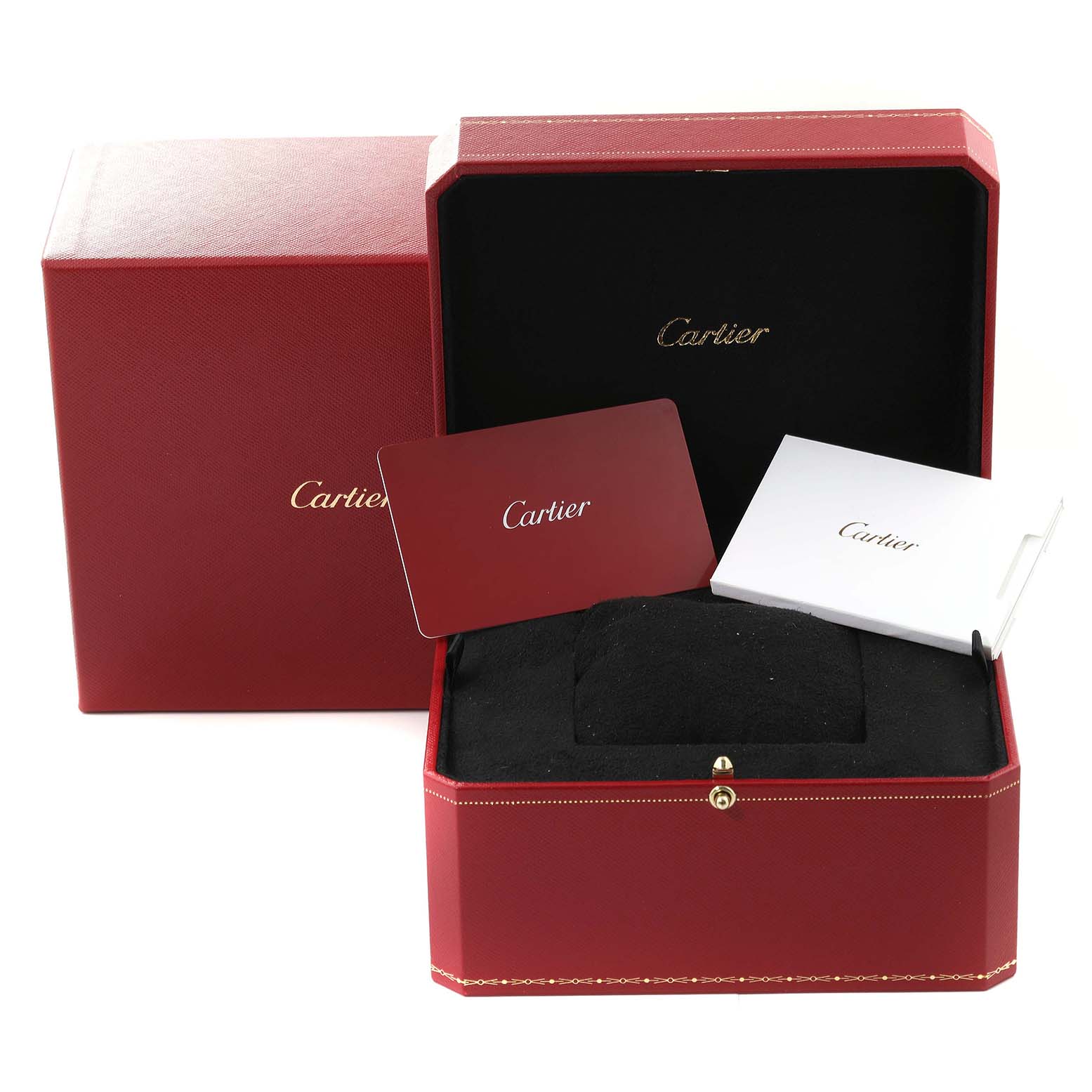 This image shows a red Cartier Tank Must WSTA0059 Women
s Stainless Steel Silver Dial WSTA0059 Women
s Stainless Steel Silver Dial watch box with documentation cards and a cushioned interior.