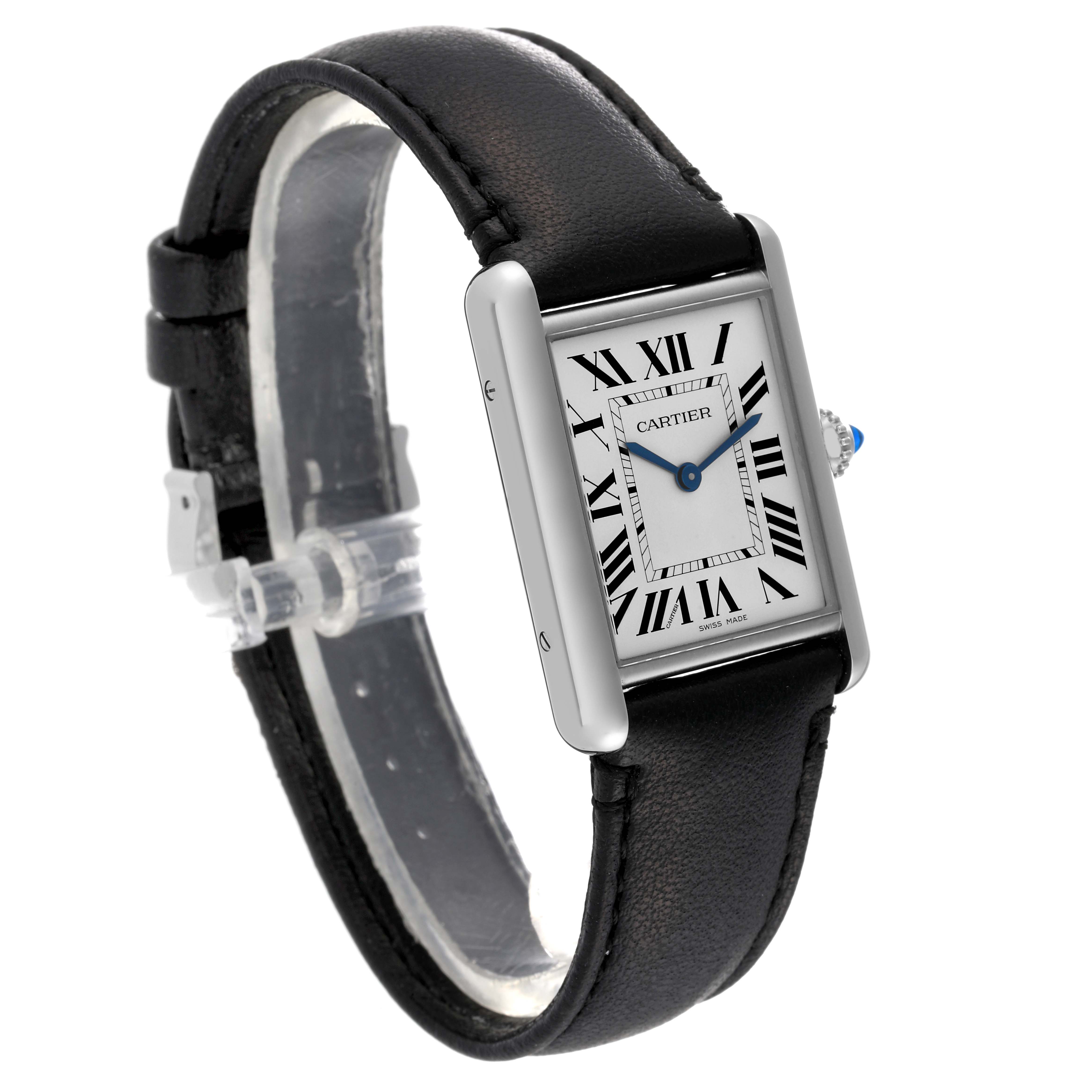 The image shows a Cartier Tank Must WSTA0059 Women
s Stainless Steel Silver Dial WSTA0059 Women
s Stainless Steel Silver Dial watch at a three-quarter angle, highlighting the face, bezel, and leather strap.