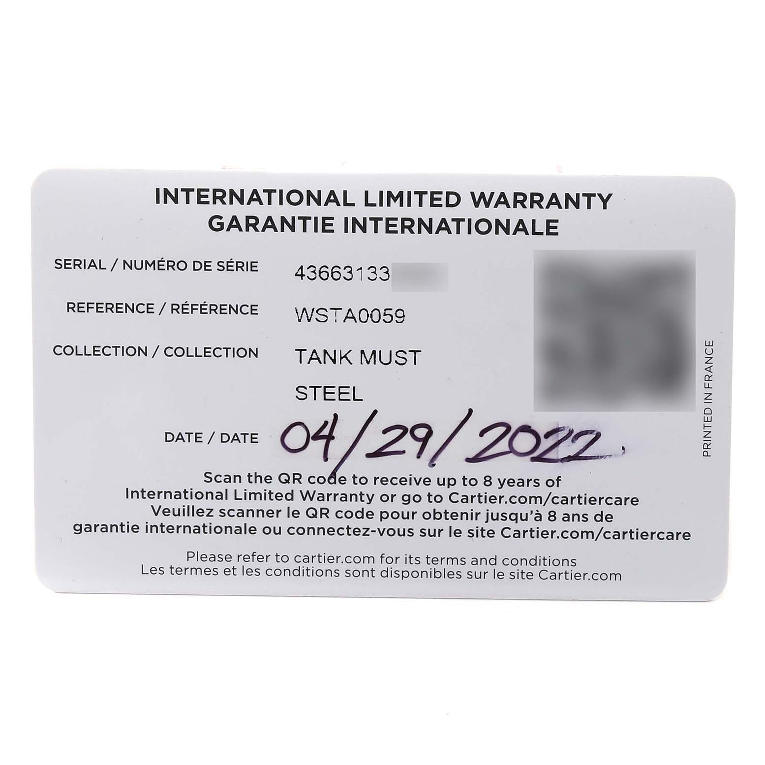 The image shows the international limited warranty card for the Tank Must model by Cartier.