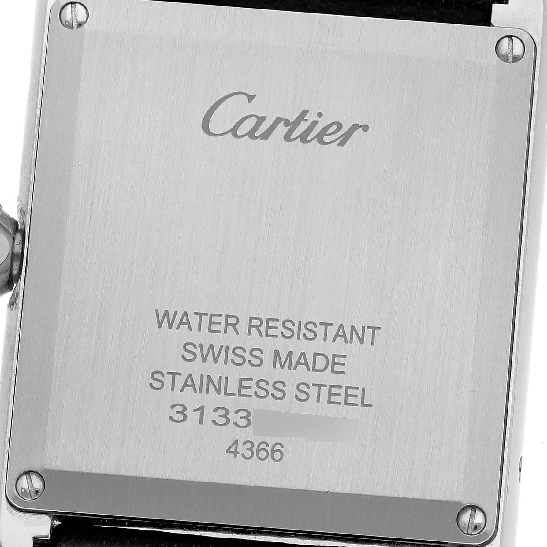 This is a rear view of the Cartier Tank Must WSTA0059 Women
s Stainless Steel Silver Dial WSTA0059 Women
s Stainless Steel Silver Dial watch, showing the stainless steel case back with inscriptions.
