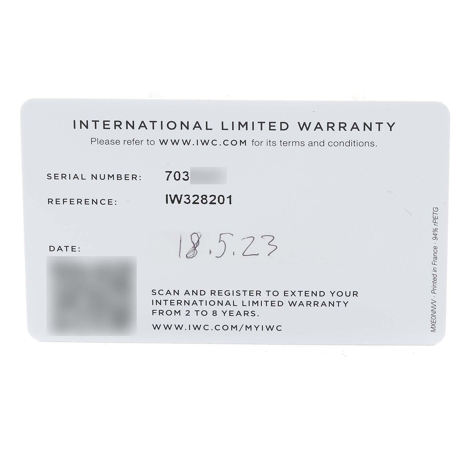The image shows the International Limited Warranty card for an IWC Pilot IW328201 Men
s Stainless Steel Black Dial IW328201 Men
s Stainless Steel Black Dial model watch, including the serial number, reference, and date.
