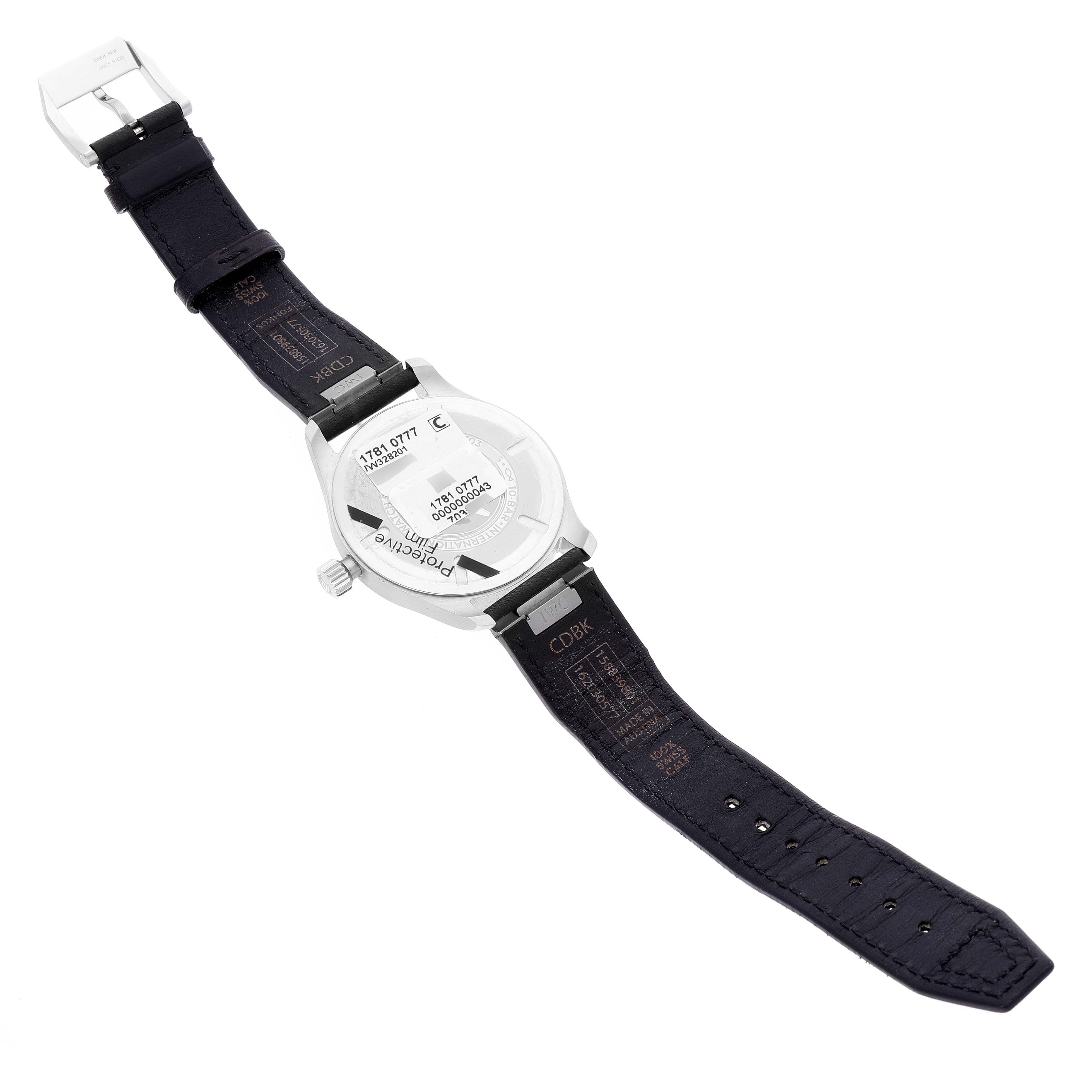 This image shows the back of an IWC Pilot IW328201 Men
s Stainless Steel Black Dial IW328201 Men
s Stainless Steel Black Dial watch laid flat, highlighting its case back, strap, and buckle.