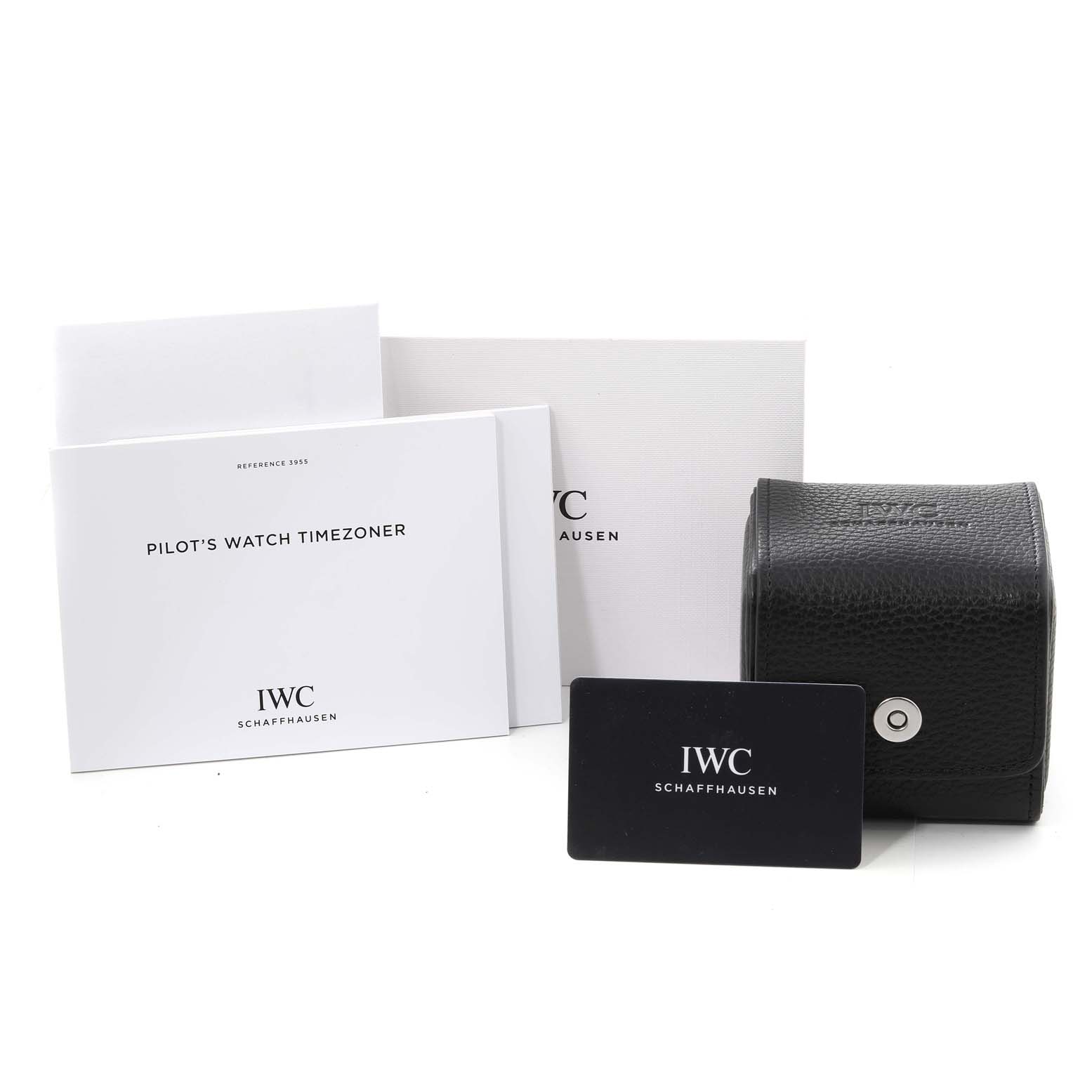 The image shows the IWC Pilot IW395505 Men's Ceramic Black Dial IW395505 Men's Ceramic Black Dial's Watch Timezoner packaging, including documents, a watch box, and a warranty card.