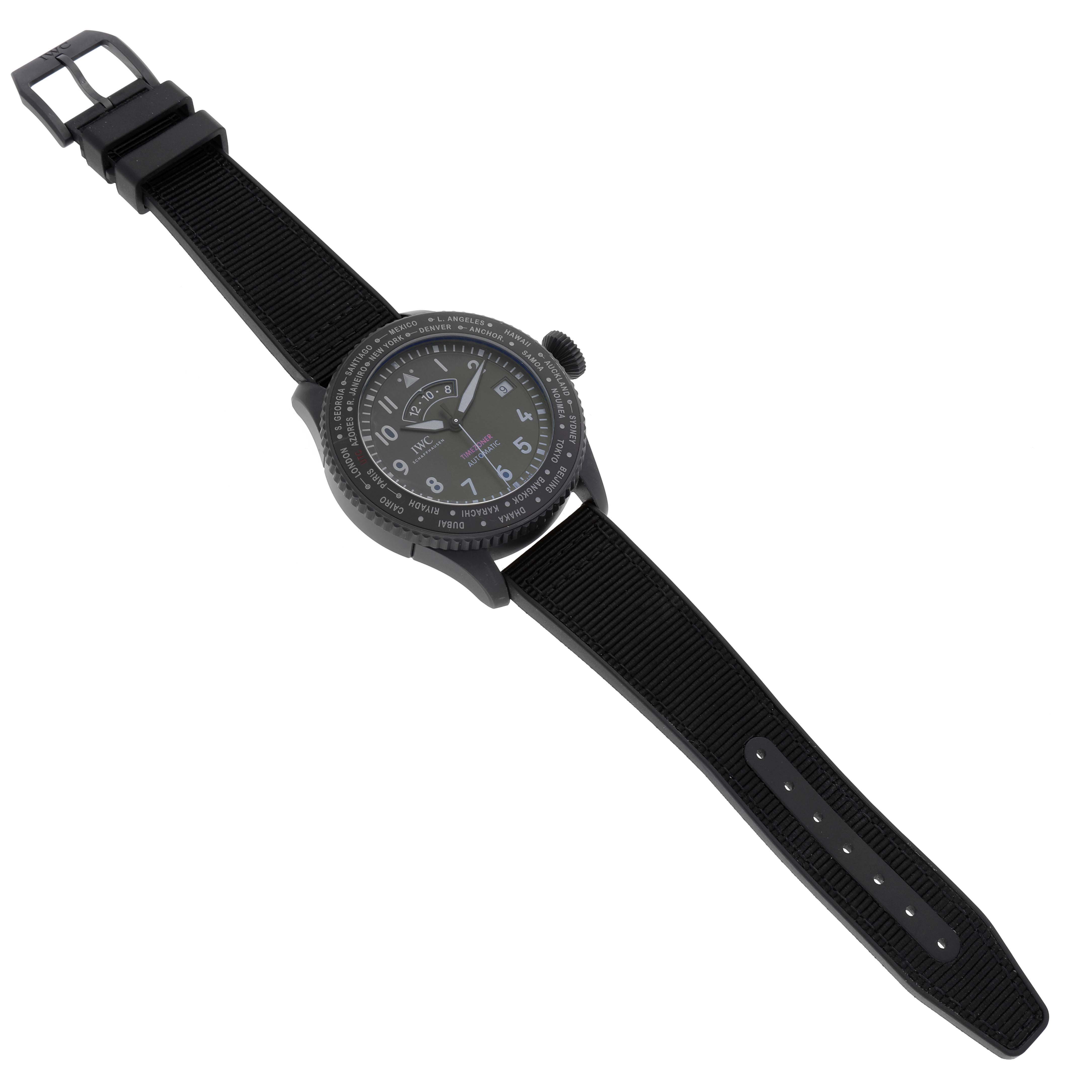 The image shows an IWC Pilot IW395505 Men's Ceramic Black Dial IW395505 Men's Ceramic Black Dial model watch at an angle revealing the face, strap, and buckle.