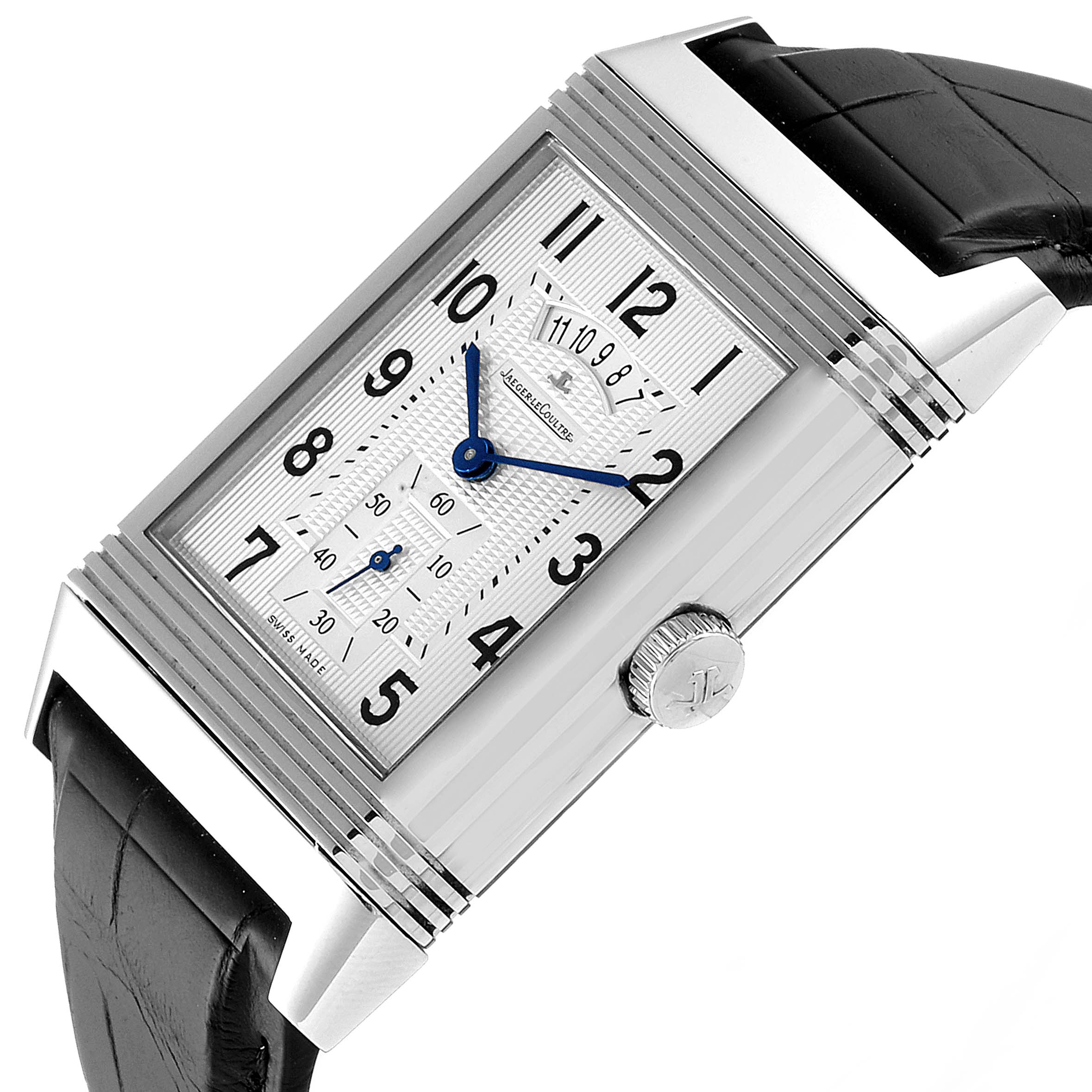 The image shows a Jaeger-LeCoultre Reverso watch angled diagonally, displaying its dial, crown, and part of the leather strap.