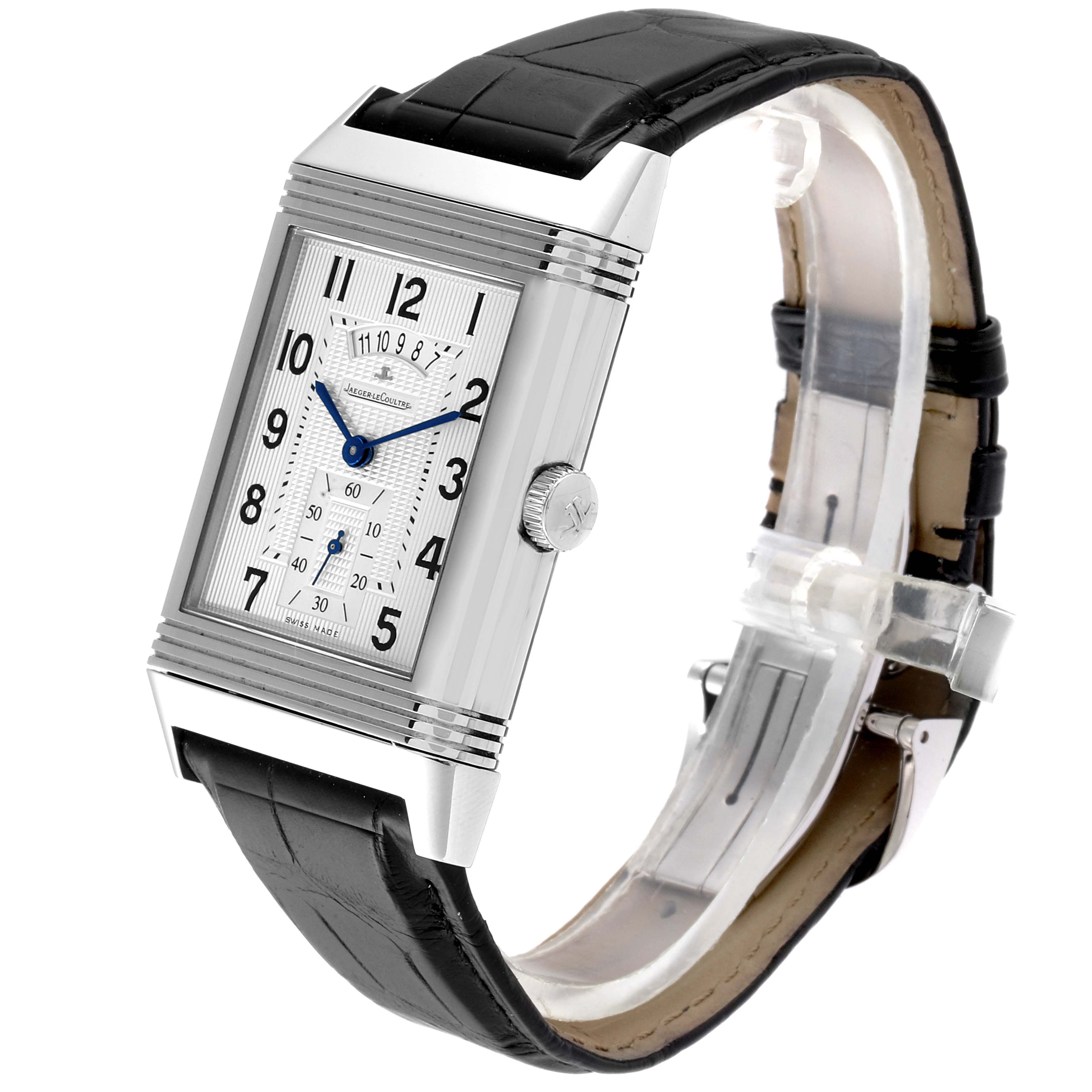 The Reverso watch by Jaeger-LeCoultre is shown at a 3/4 angle, displaying the rectangular face, black strap, and side crown.