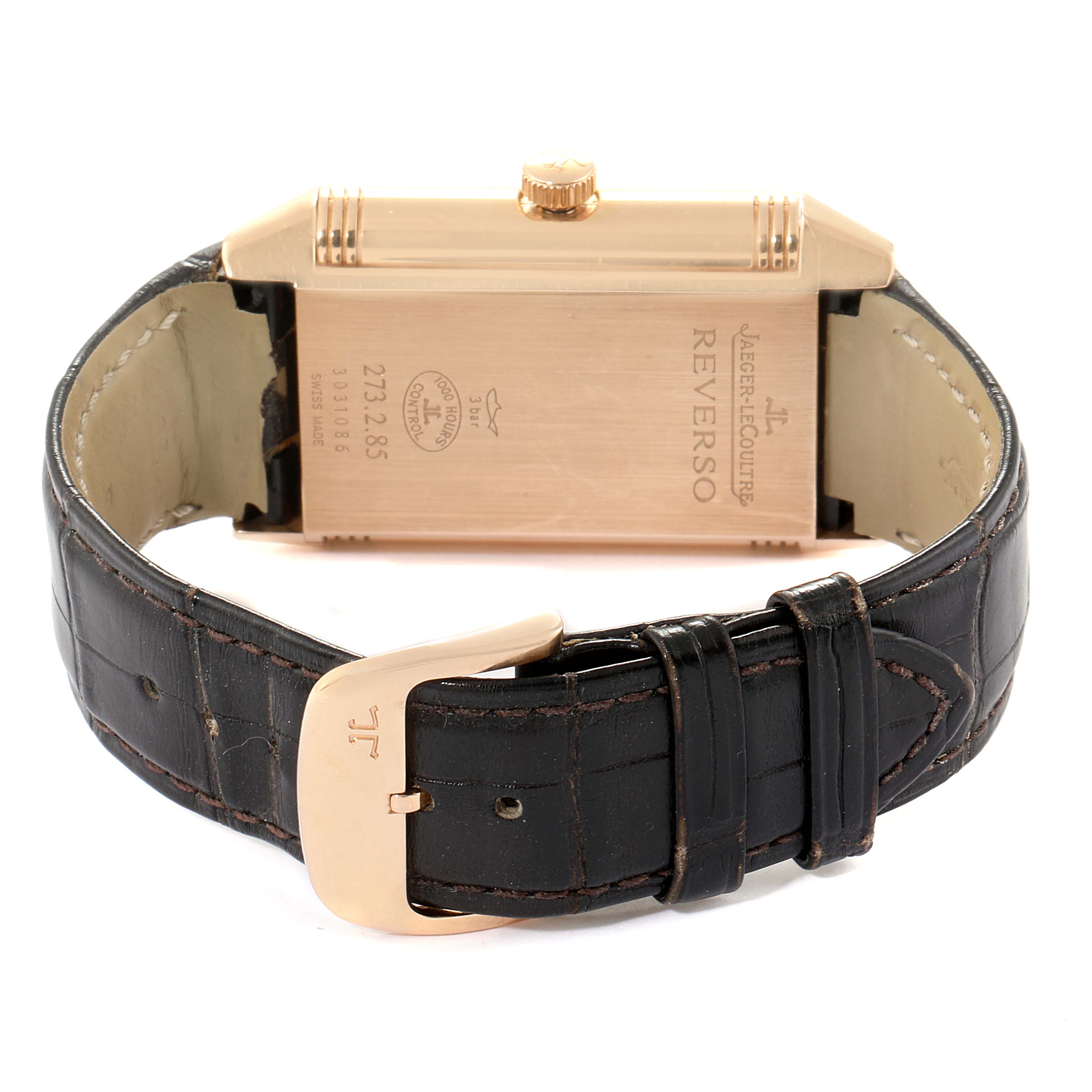 The image shows the back case, the crown, and the leather strap with a buckle of the Jaeger LeCoultre Reverso Q3742521 Men's Rose Gold Silver Dial Q3742521 Men's Rose Gold Silver Dial watch.